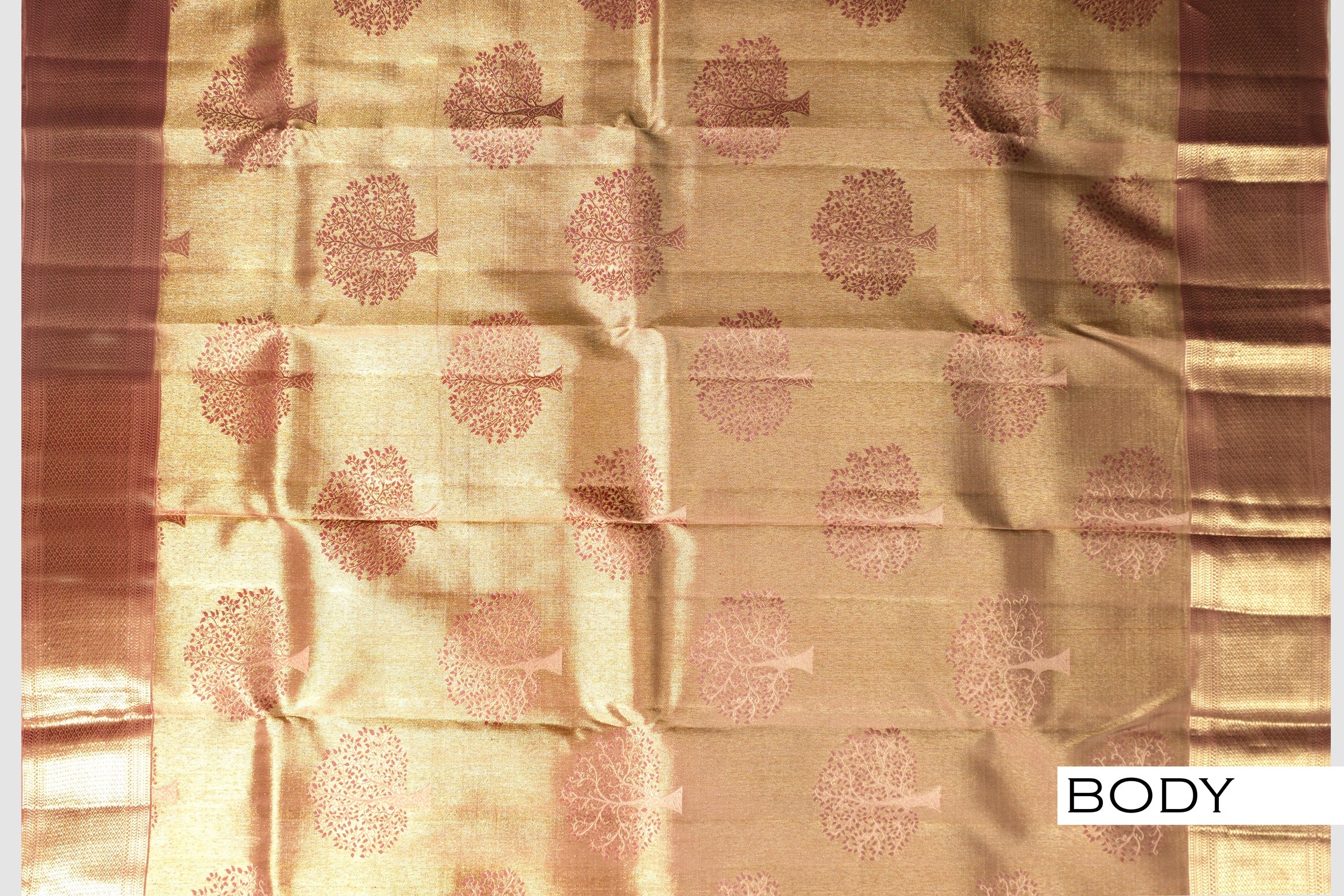Light golden color tissue pure Kanchipuram wedding saree.