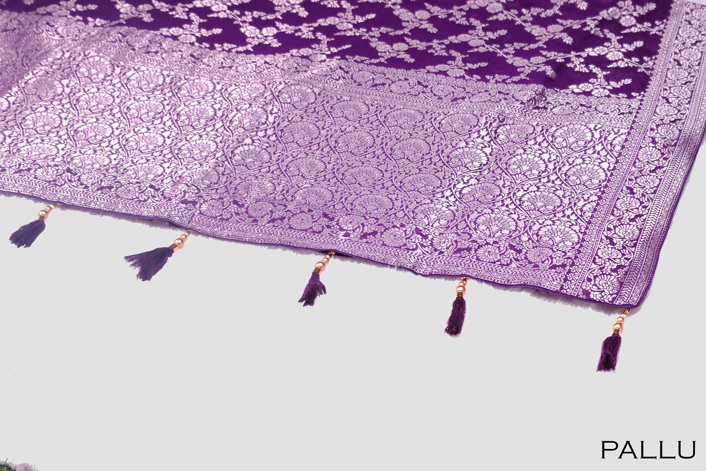 Violet color georgette Banarasi saree.