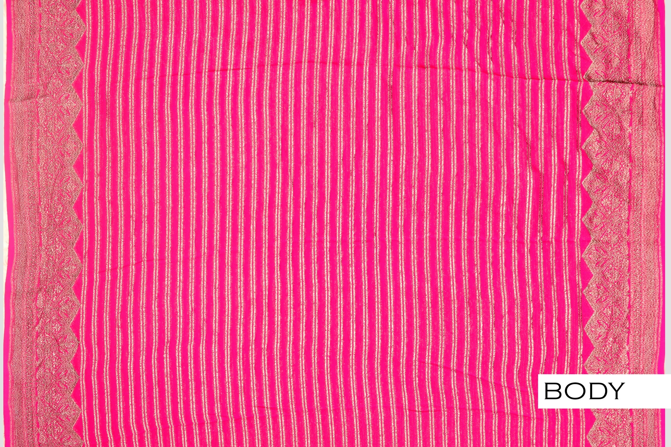 Rani pink color Banarasi saree.