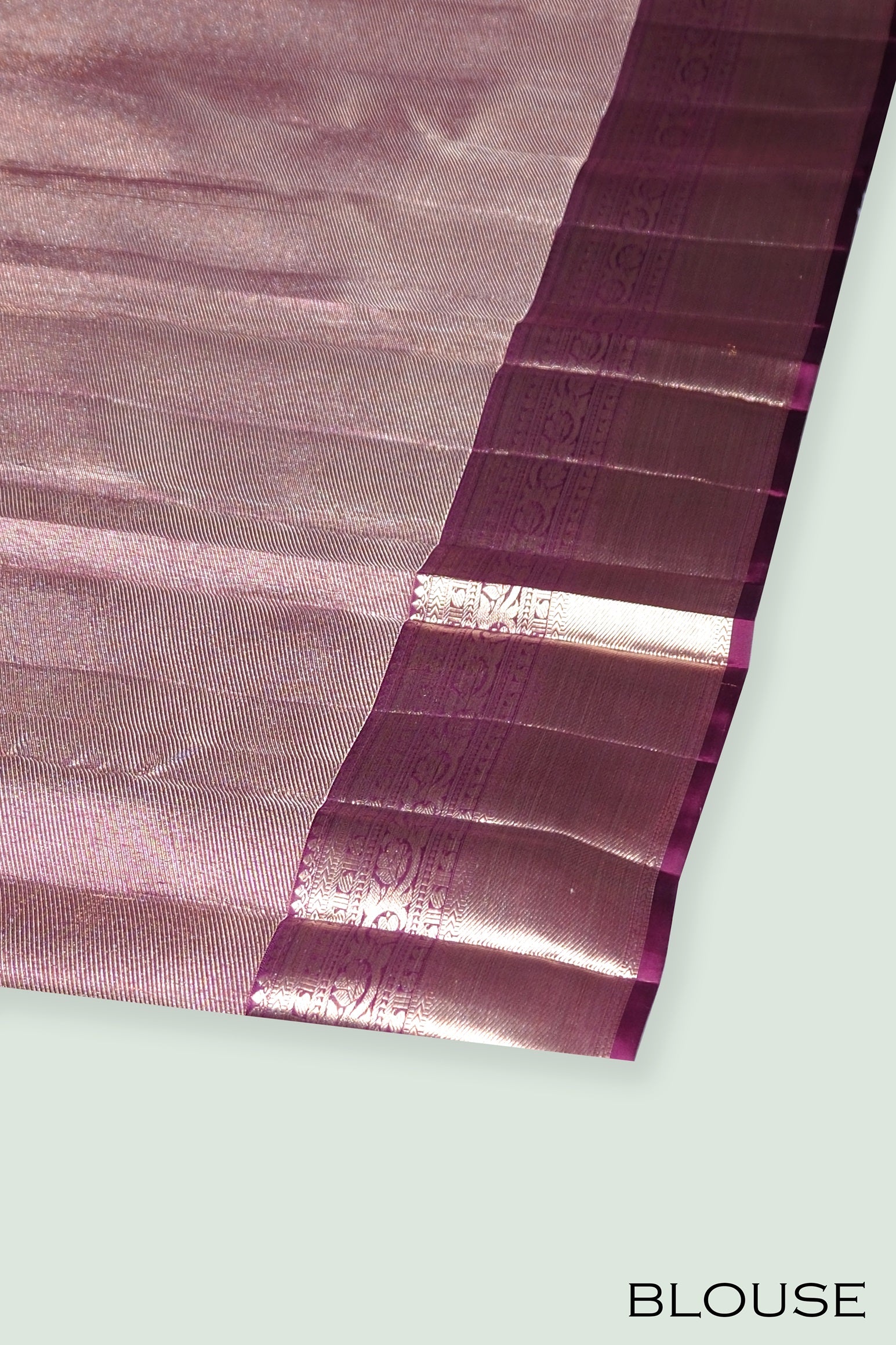 Wine color pure Kanchipuram wedding saree.