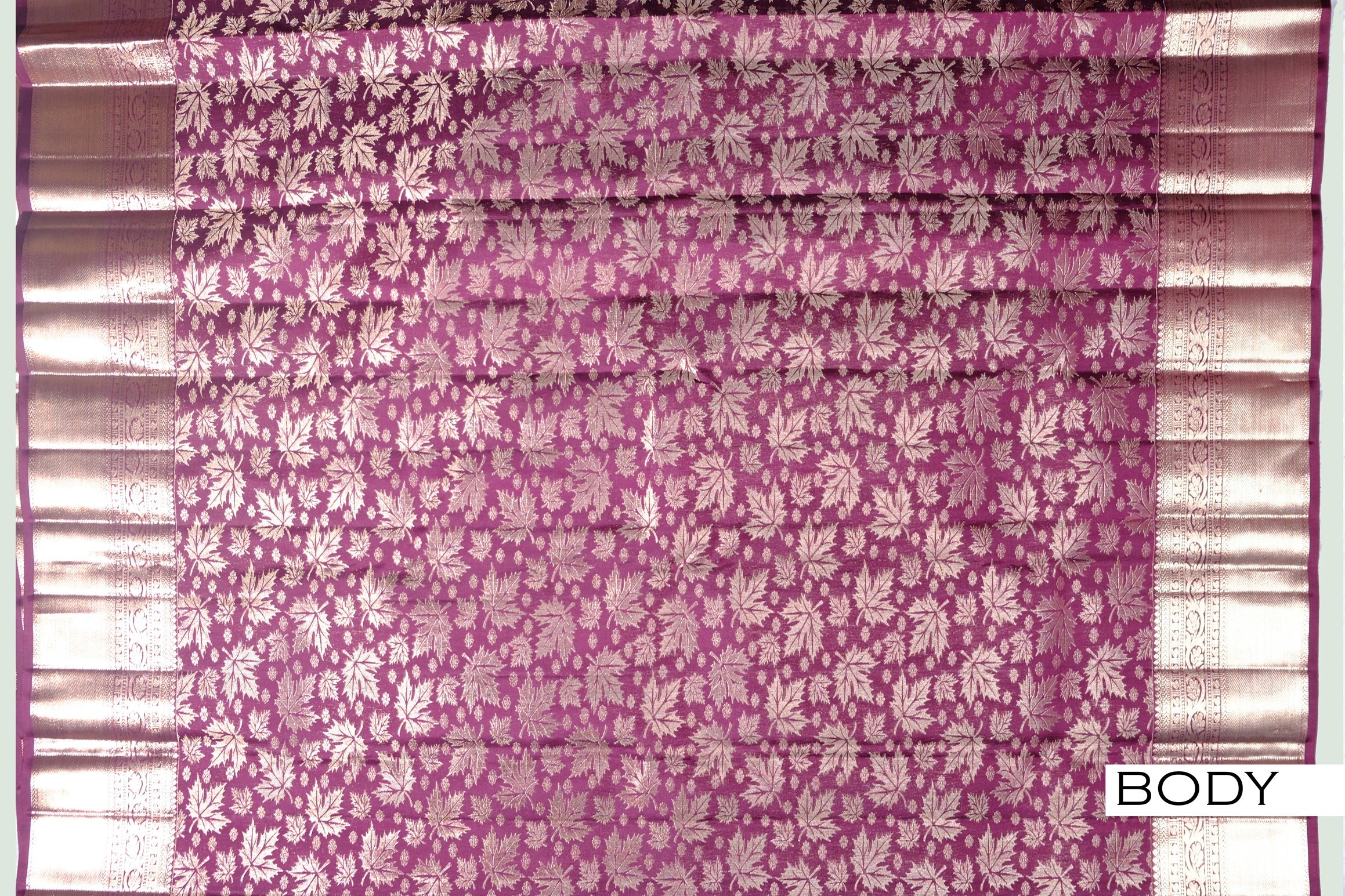 Wine color pure Kanchipuram wedding saree.