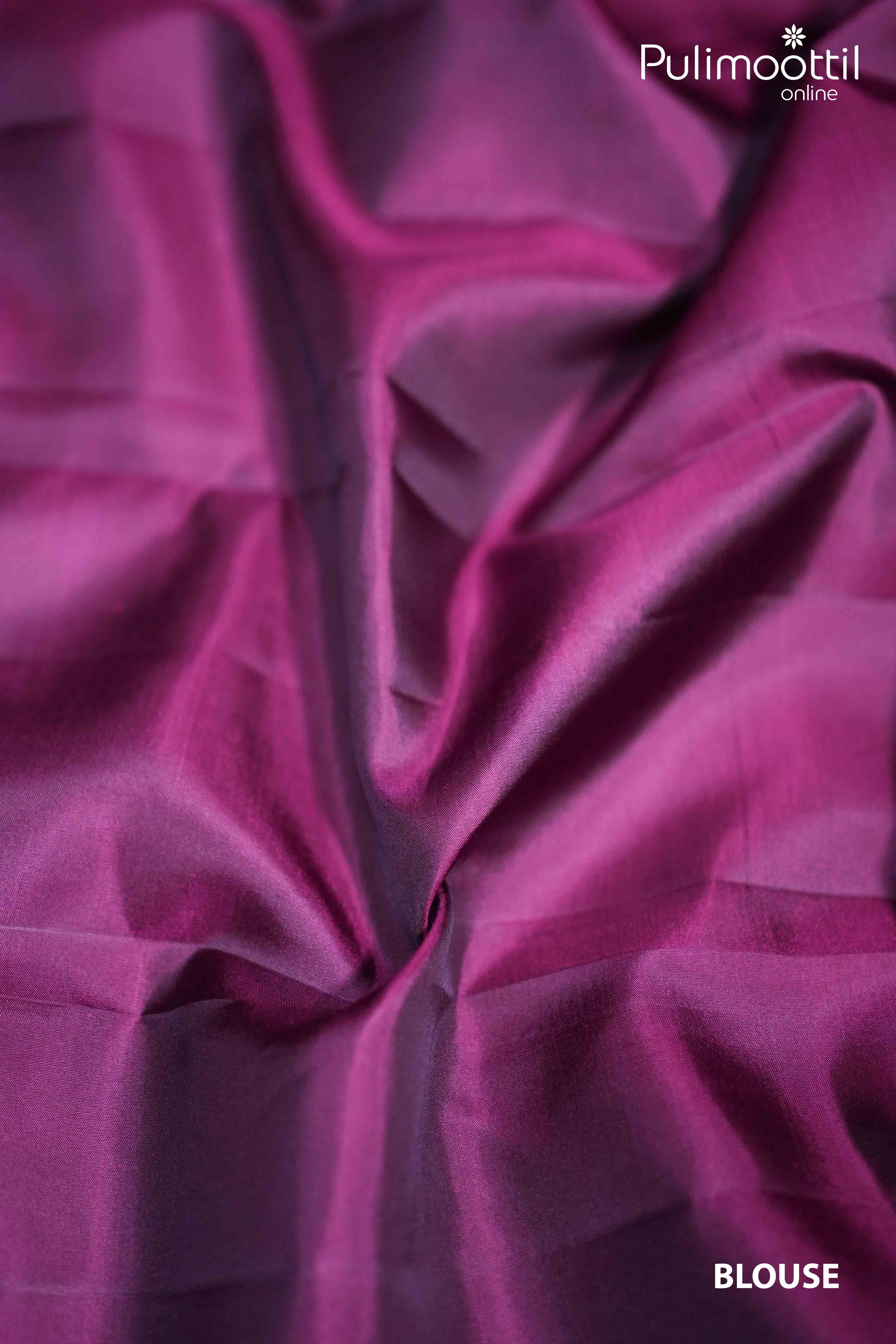 Plain purplle plum Kanchipuram blouse piece in lustrous silk fabric, perfectly complementing the copper zari wedding saree for bridal and Onam celebrations.