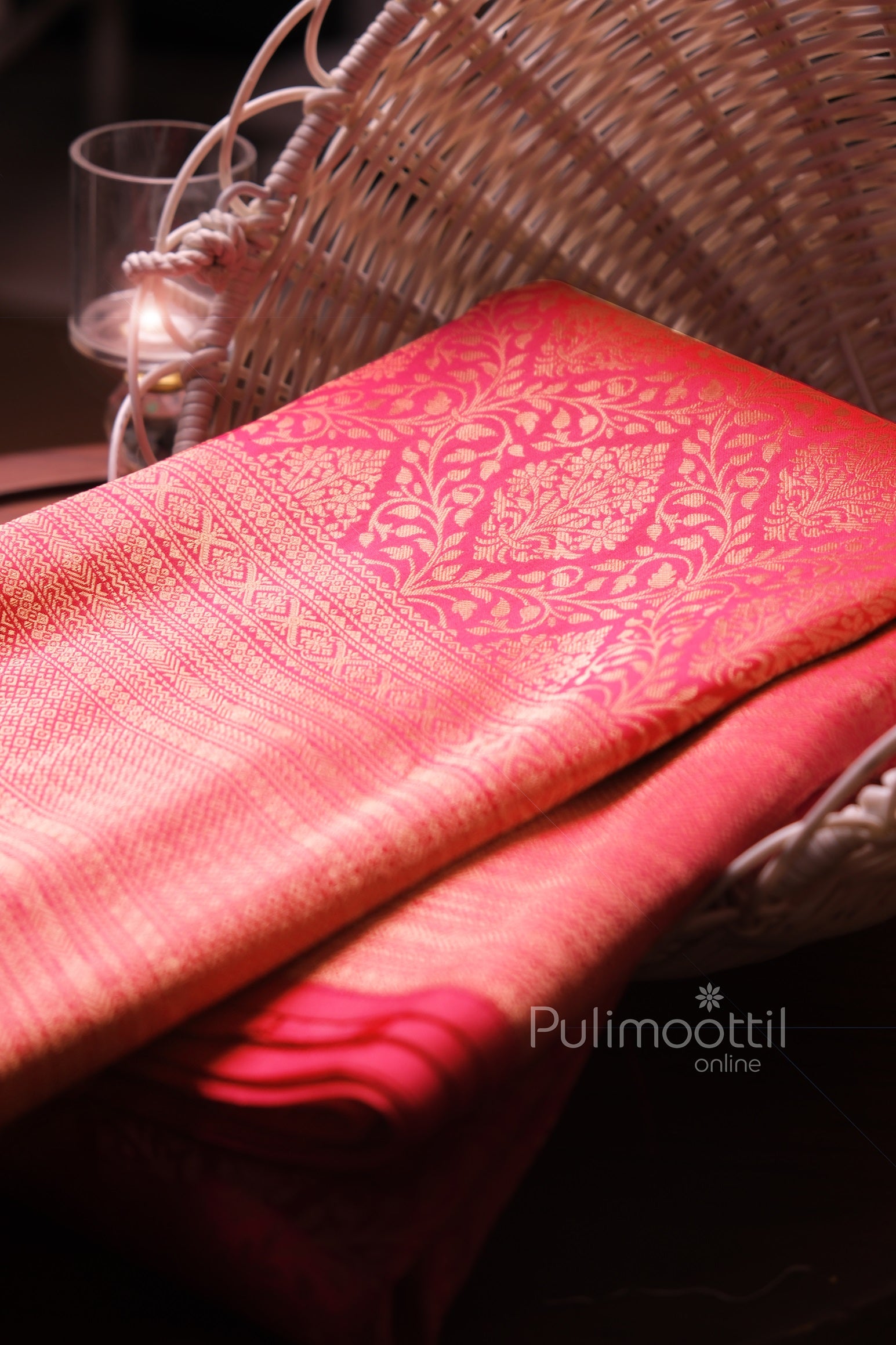 Bright red silk saree with intricate golden zari floral and geometric weaving