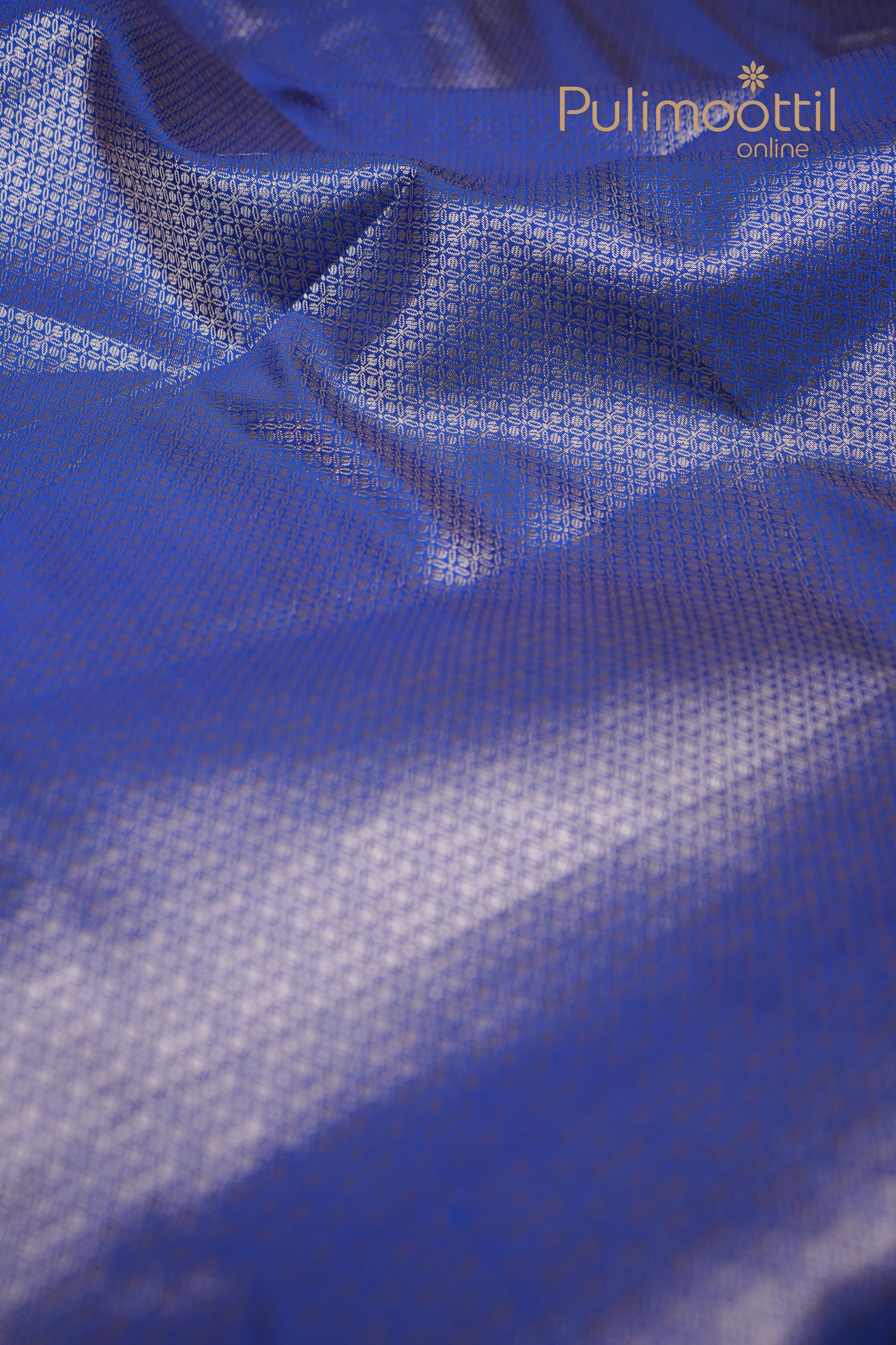 Matching royal blue semi silk blouse piece with plain finish and subtle sheen.