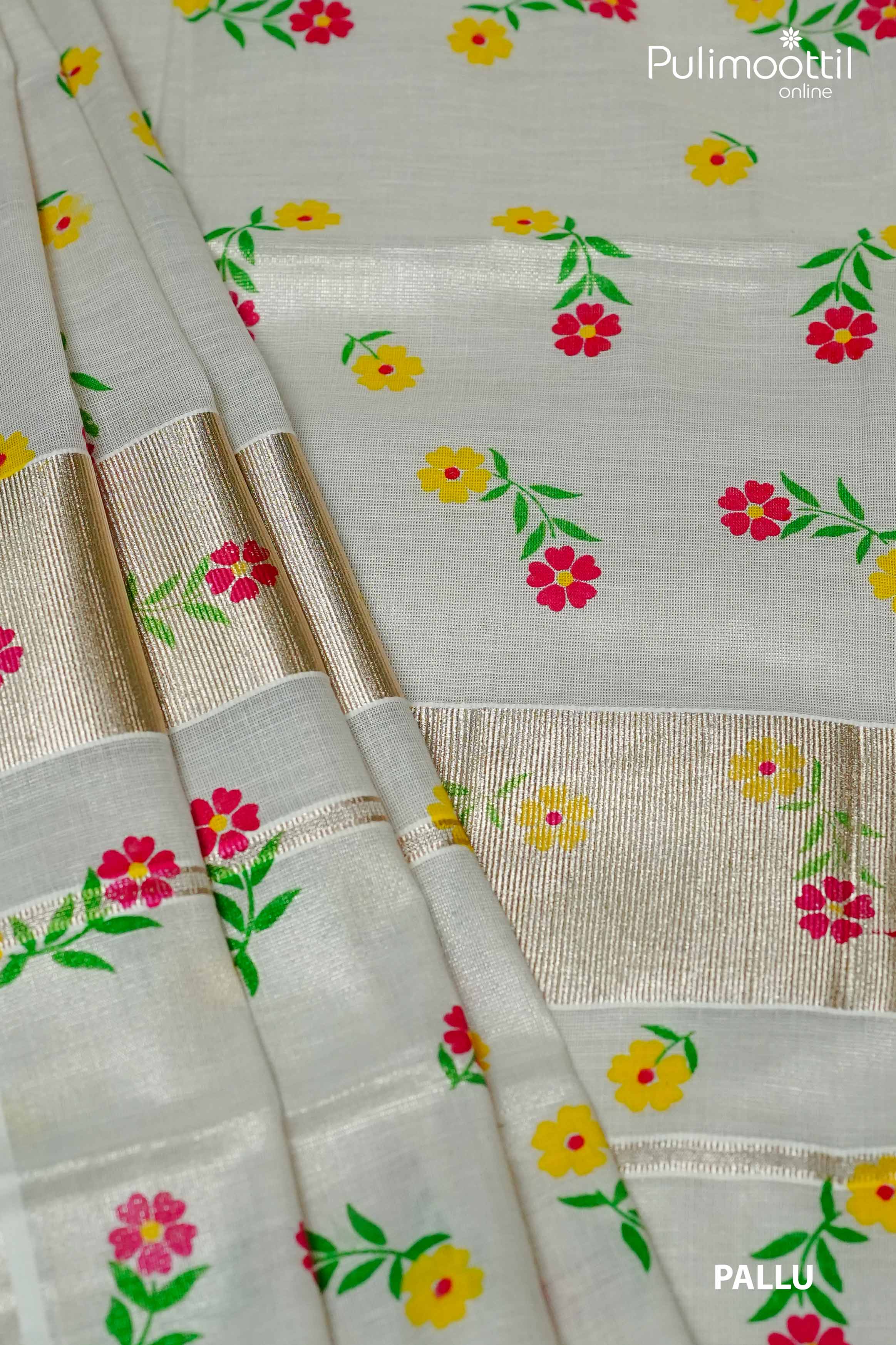 Close-up of floral printed pallu in cream Kerala tissue saree with silver border