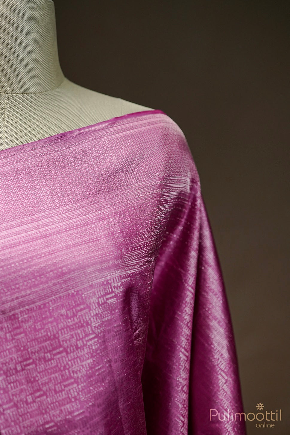 Top-right close-up of soft-pink Kanchipuram saree on mannequin, showing silk sheen and brocade weaving.