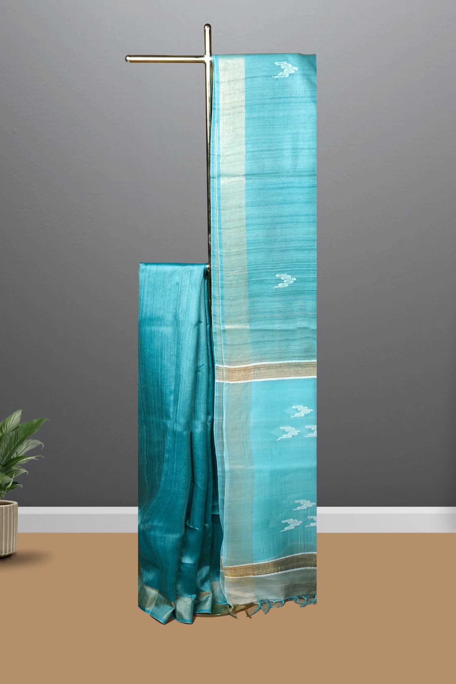Teal blue color jute silk saree.