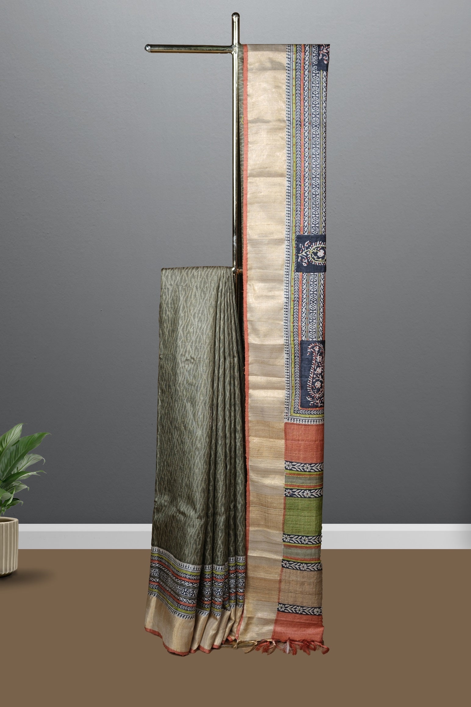 Olive green color pure jute silk saree.