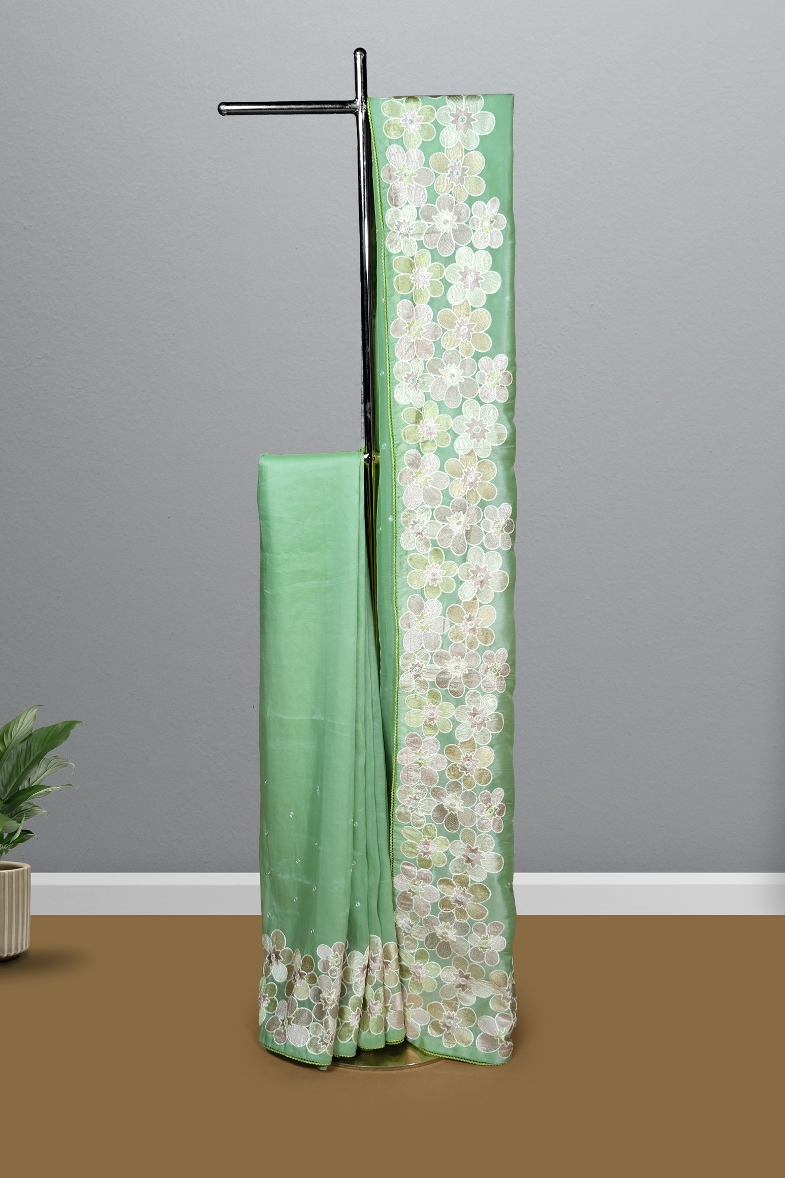 Pastel green color soft Organza saree.