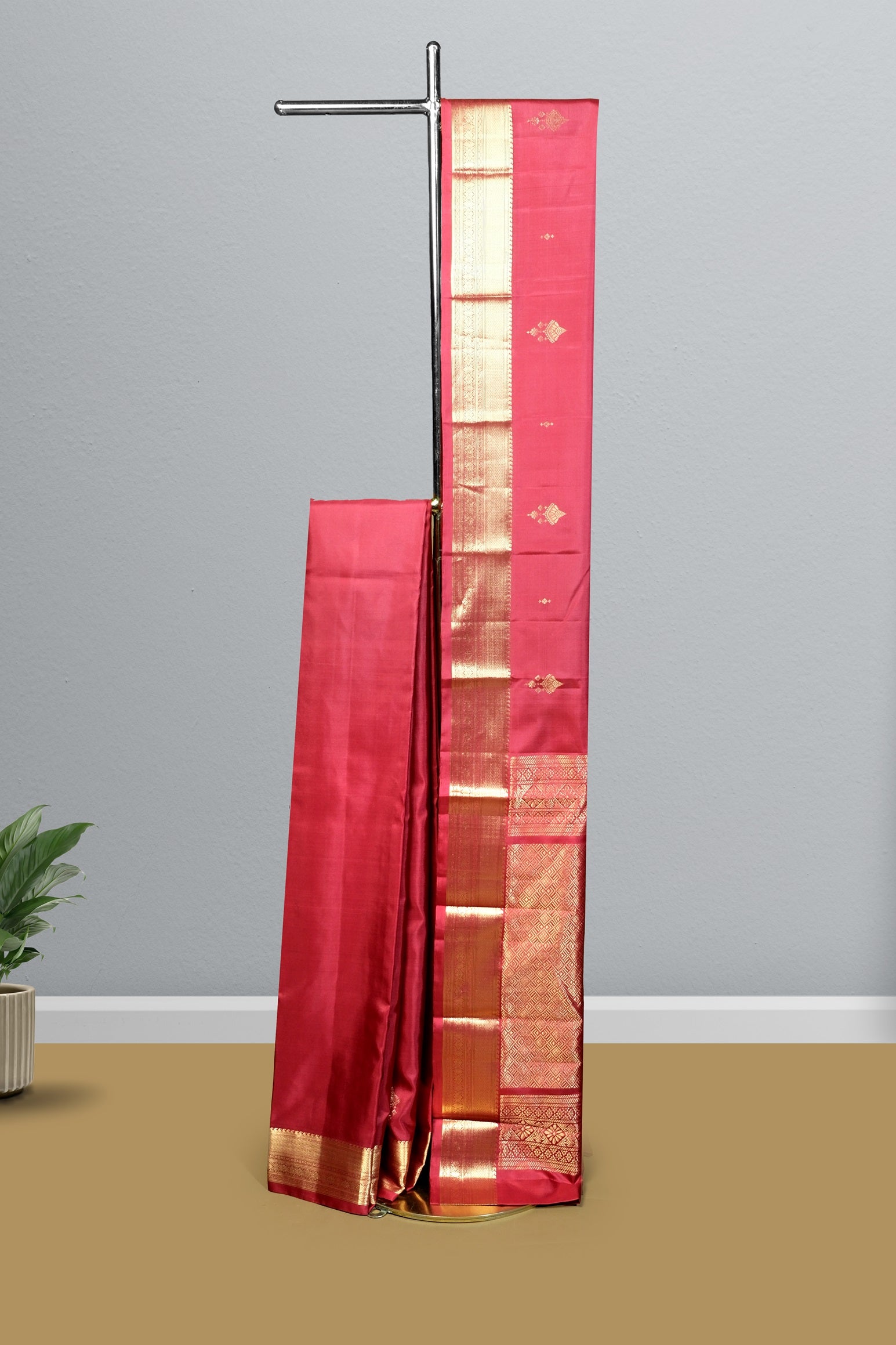 Red color pure Kanchipuram silk saree.