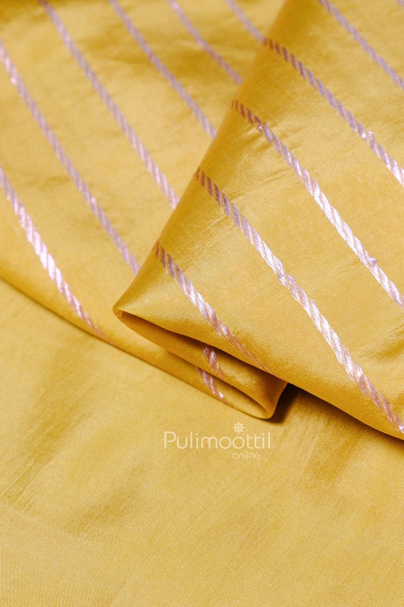 Diagonal striped pattern in silver zari on yellow silk saree, highlighting elegant craftsmanship.