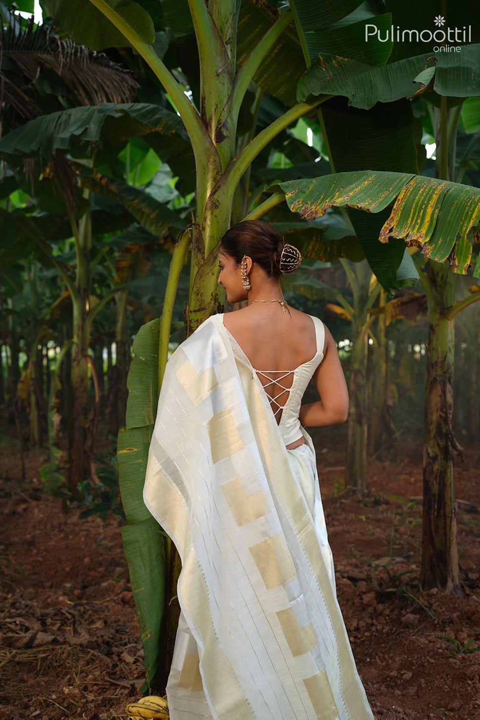 Offwhite color Kerala traditional Onam saree