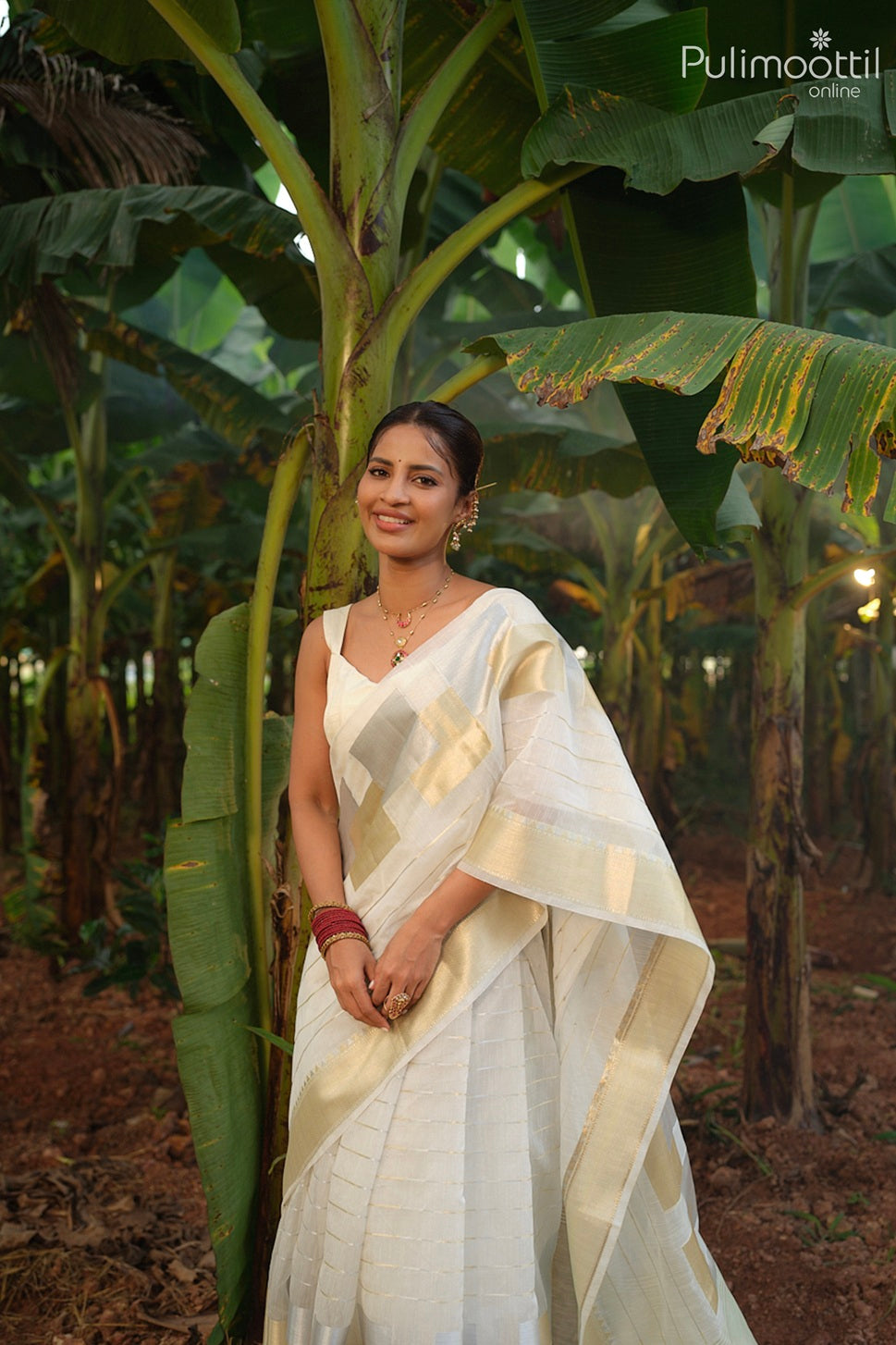 Offwhite color Kerala traditional Onam saree
