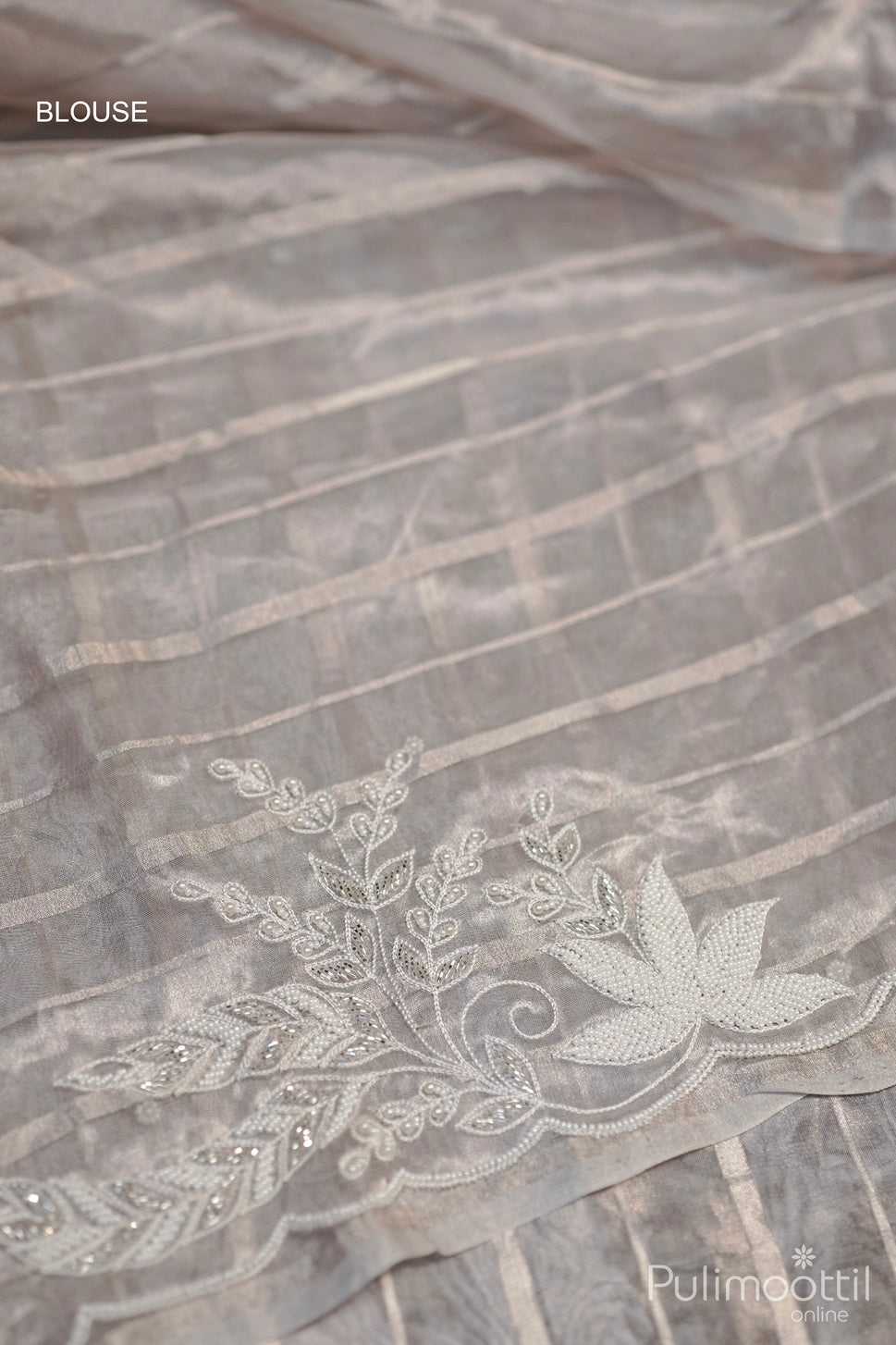 Ivory Colour Fancy Organza Saree.