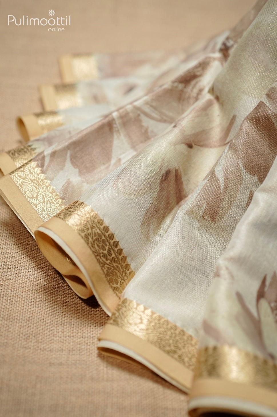 Light Gold Colour Kerala Tissue Floral Print Fancy Saree.
