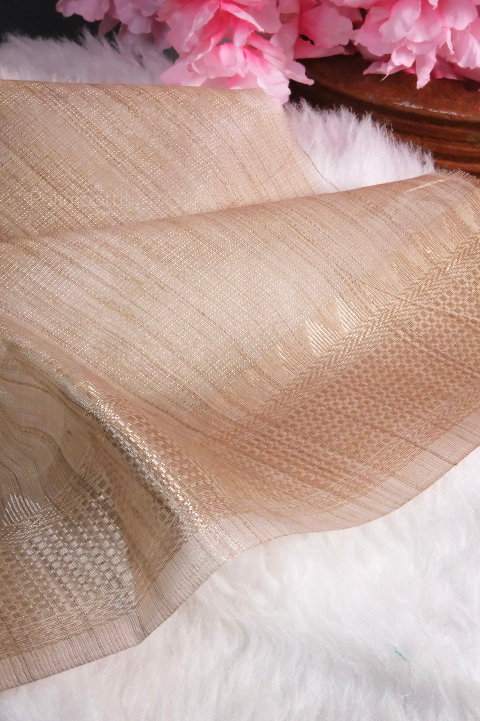 Chiku color matching blouse with Banarasi zari border, perfectly complementing the tissue silk saree.