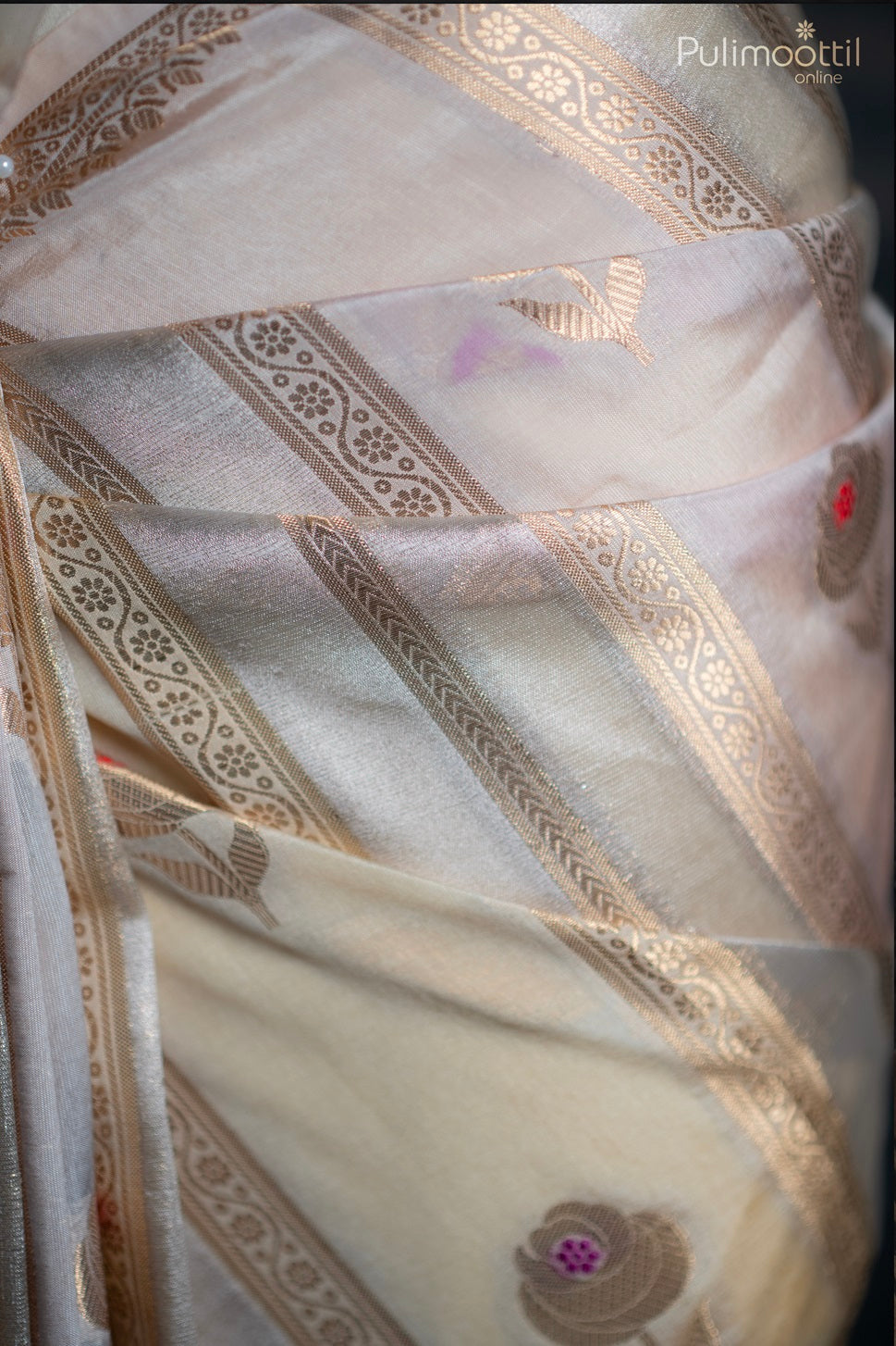 Bone cream colour organza saree.