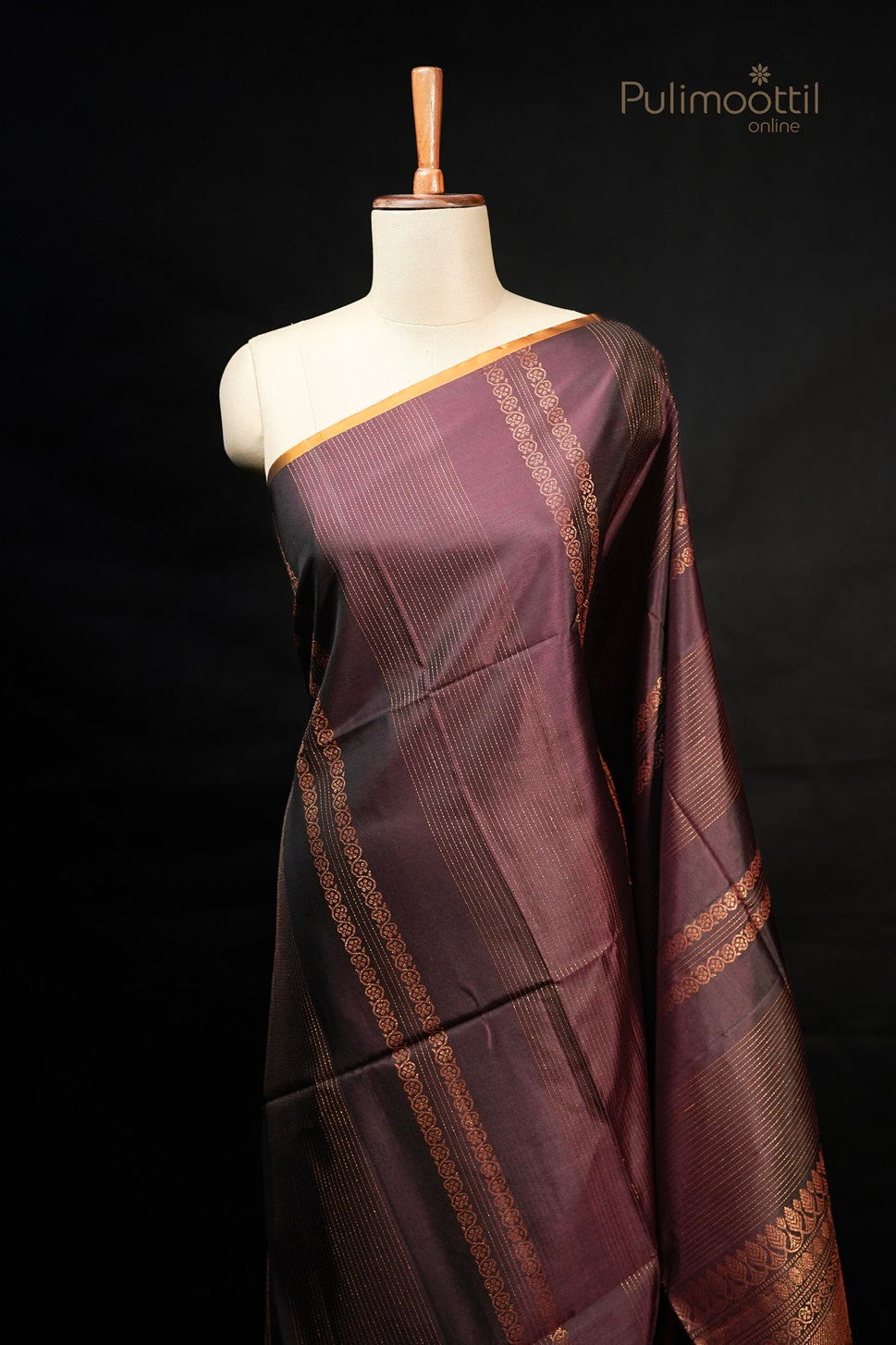 Full drape shot of the Dark Maroon Kanchipuram Soft Silk Saree on a mannequin, showcasing the vertical golden designer stripes and intricate border.