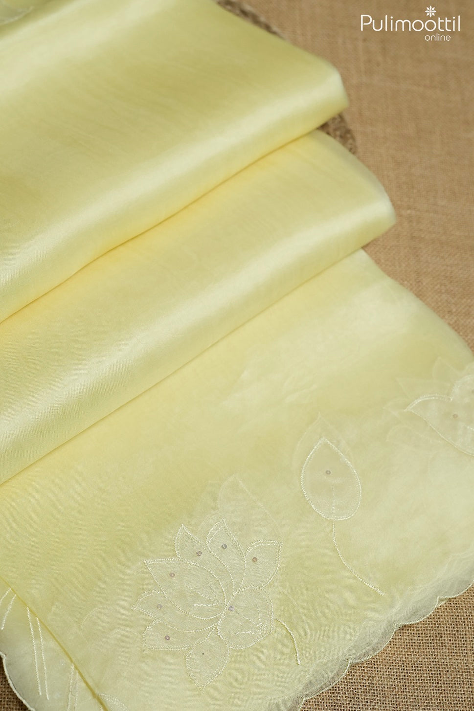Light yellow color organza fancy saree