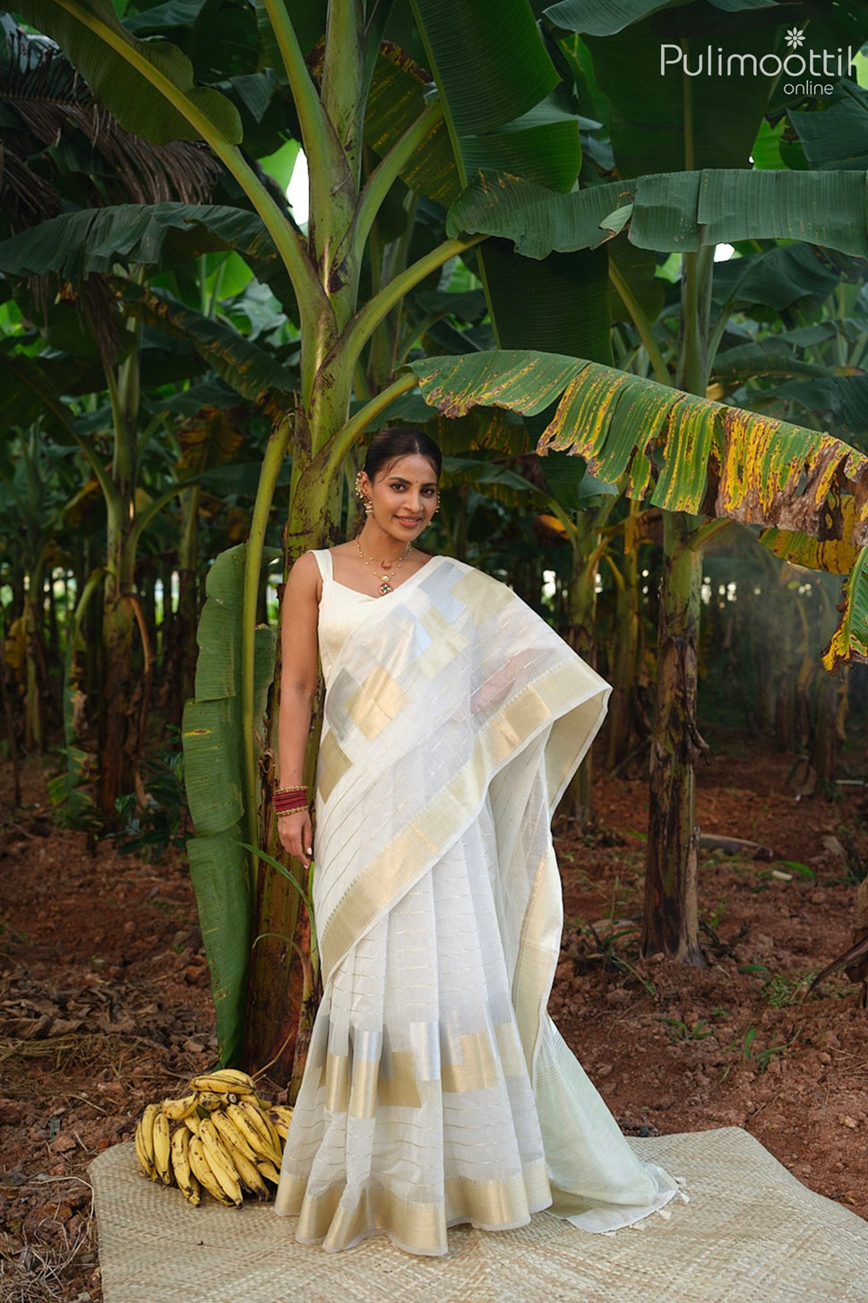 Offwhite color Kerala traditional Onam saree