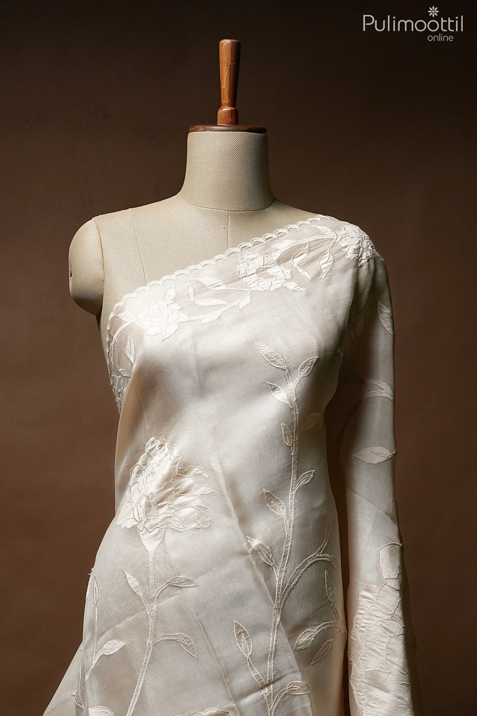 Ivory color organza saree