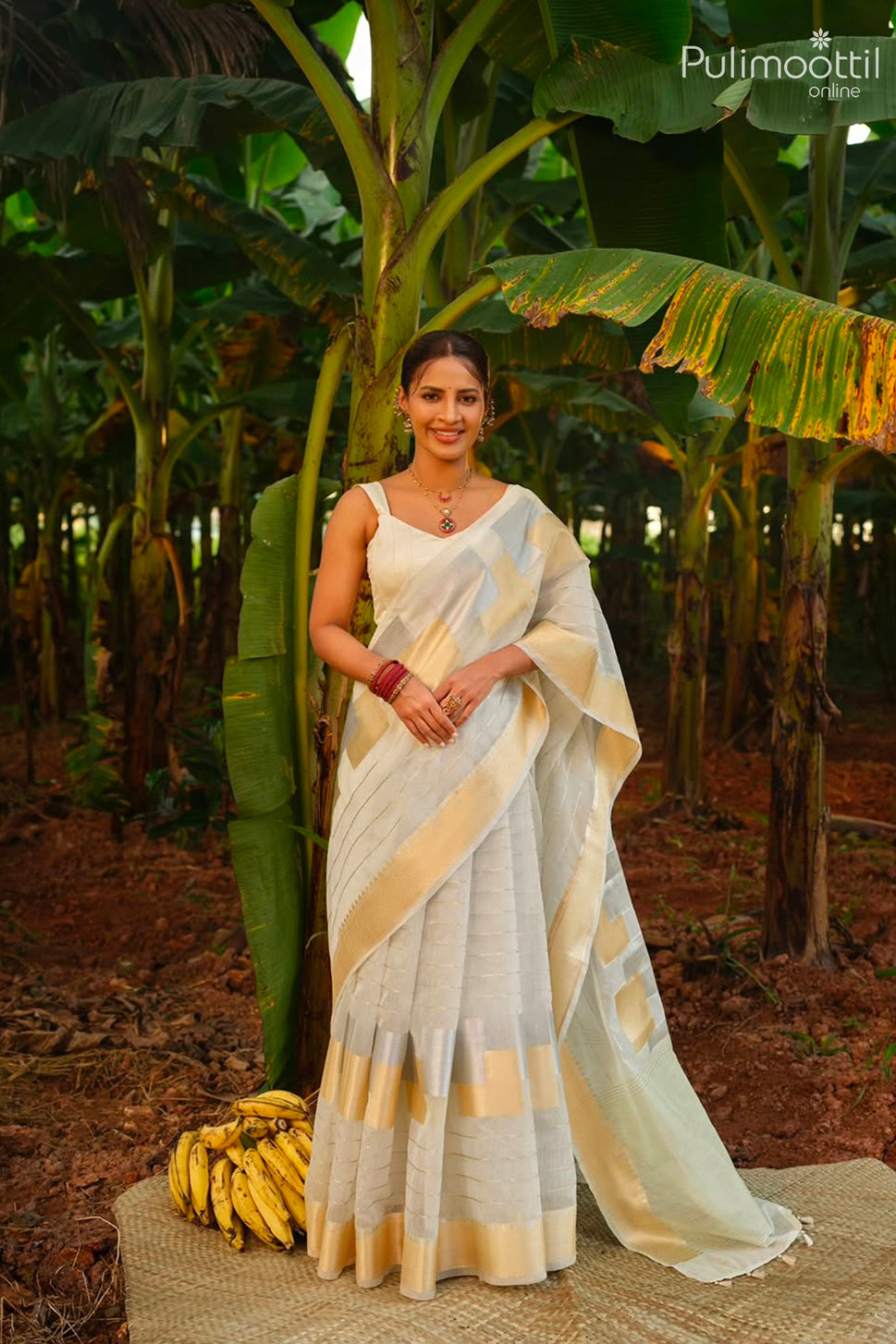 Offwhite color Kerala traditional Onam saree