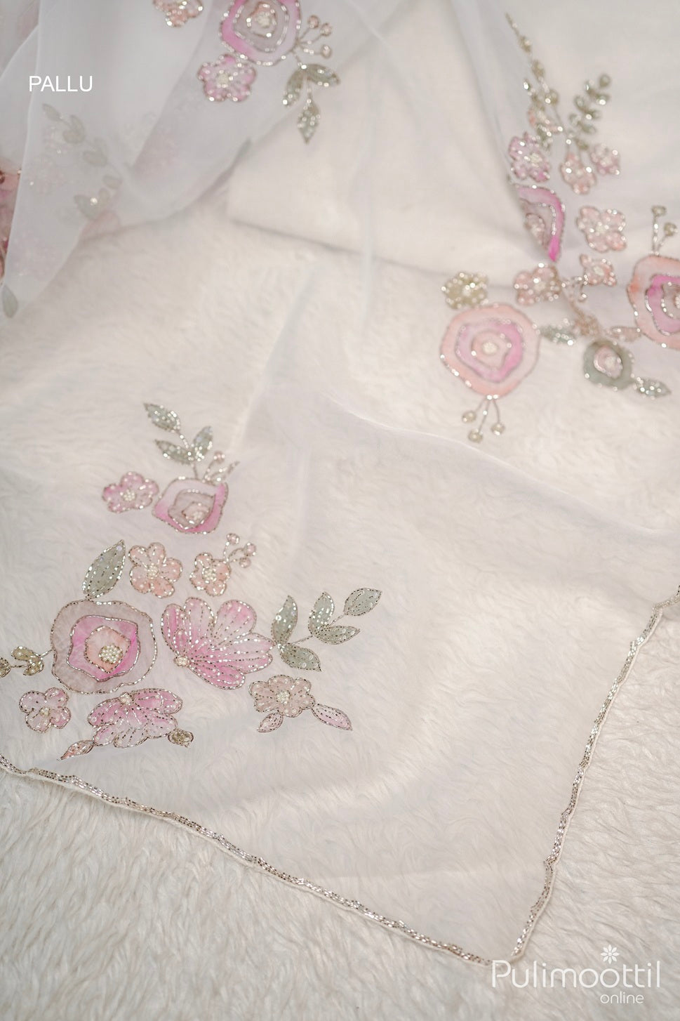 White Colour Organza Fancy Saree.