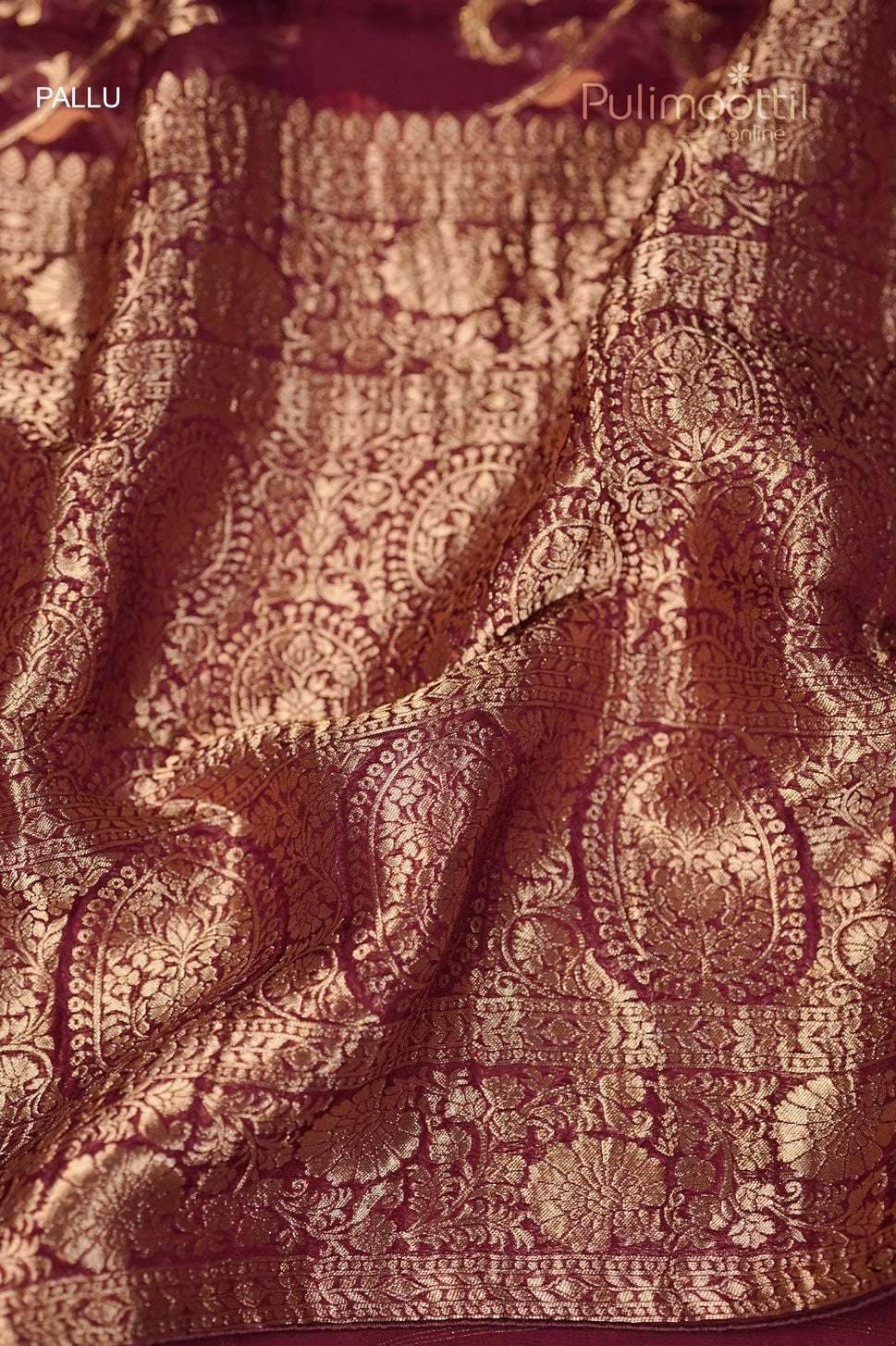 Close-up of the Pallu of Purple Banarasi Saree with Intricate Golden Brocade Design