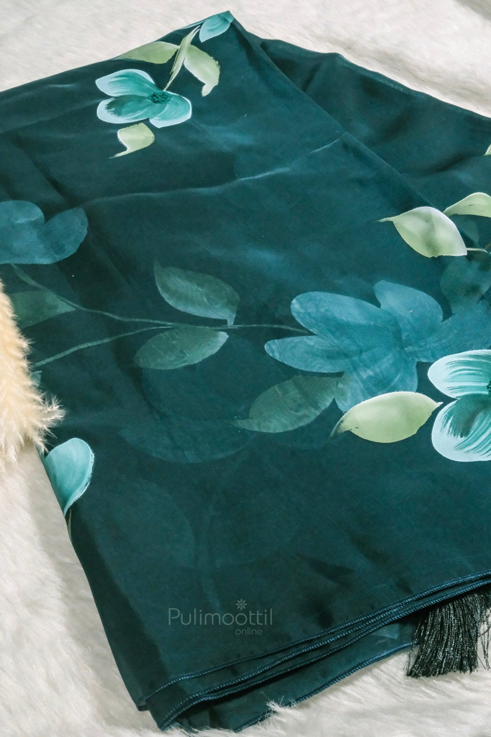 Peacock blue soft organza saree with hand-painted floral design and subtle green leaves