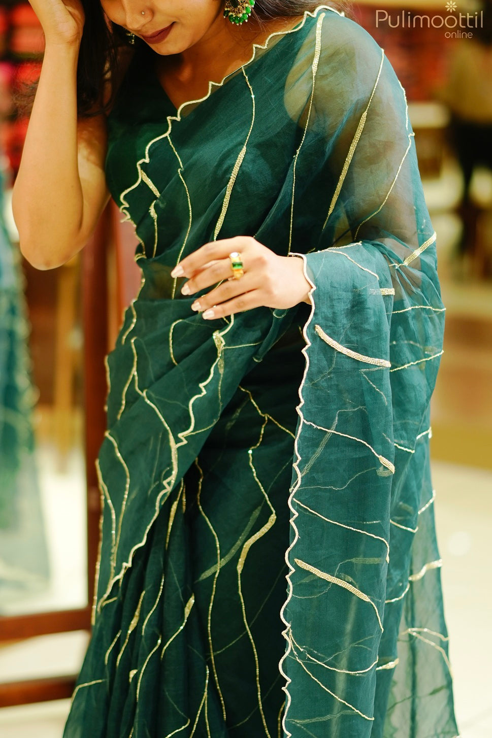 Bottle green color organza saree