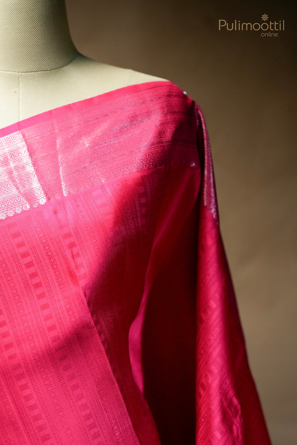 Rani pink-colored Kanchipuram self-print designer saree