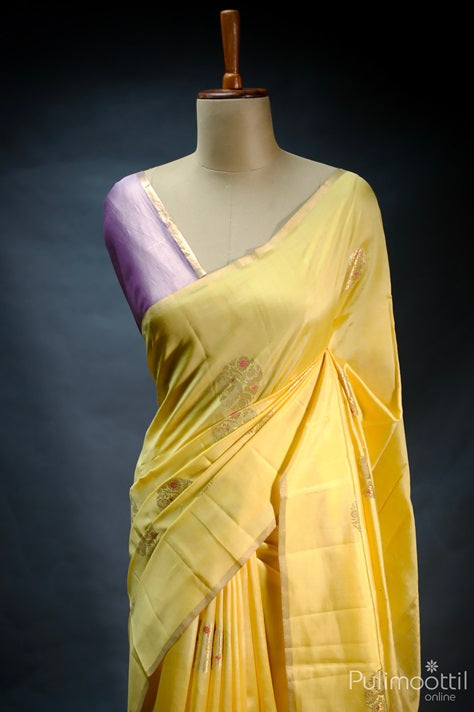 Flax Golden Yellow Colour Pure Chiniya Banarasi Silk Saree.