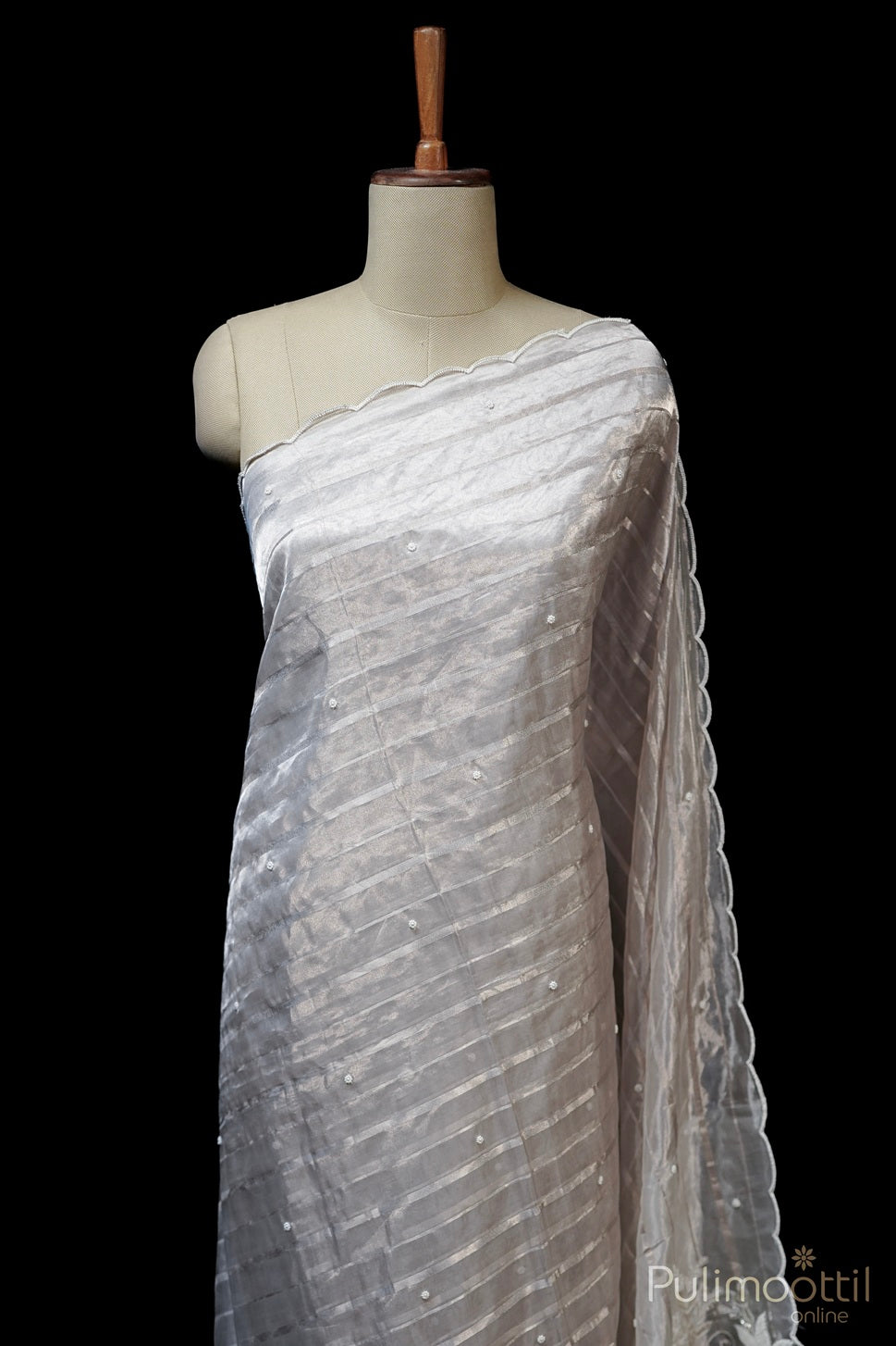 Ivory Colour Fancy Organza Saree.