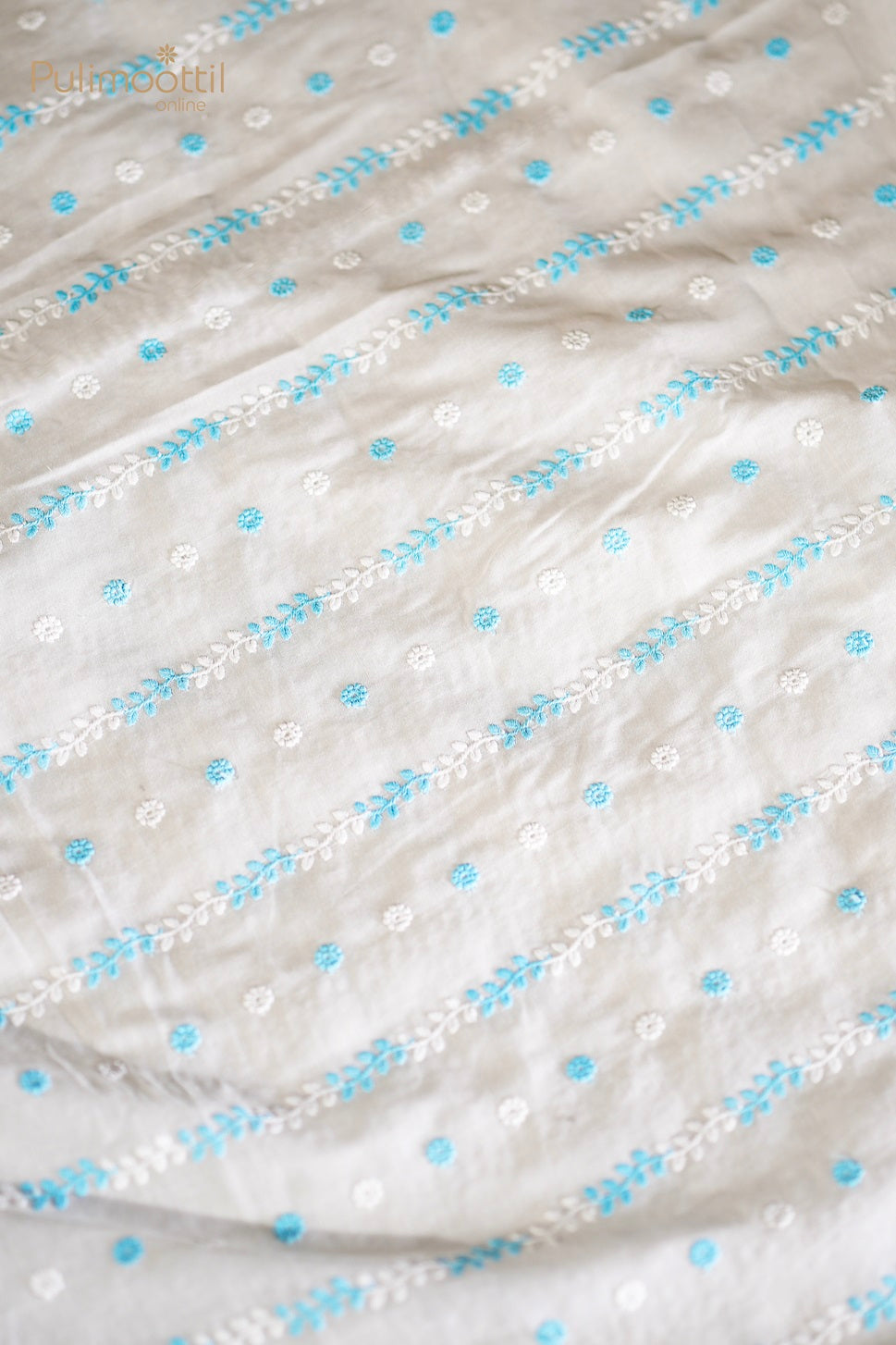 White and Sky Blue Embroidery Work