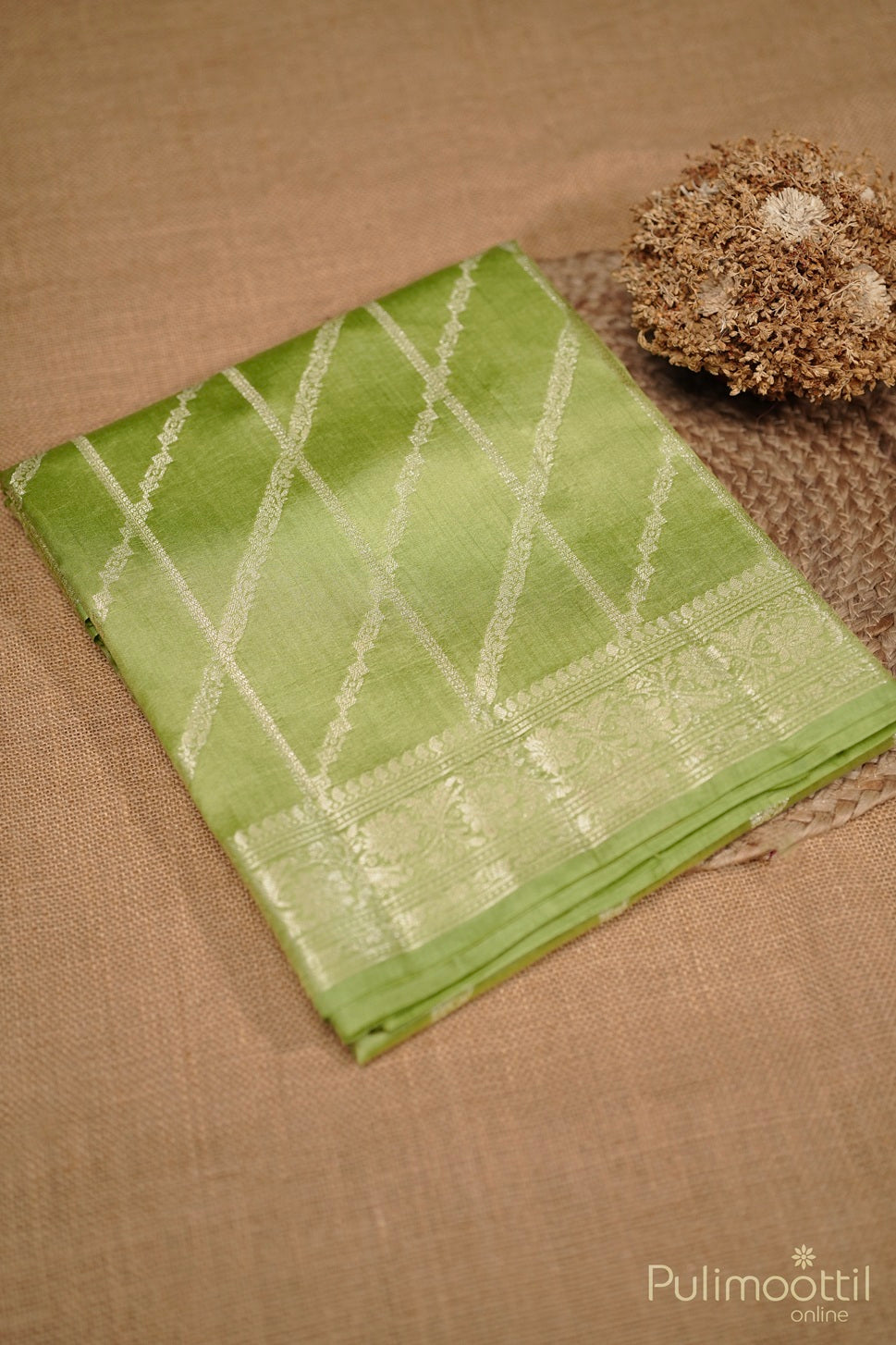 Dusty Green Colour Chiniya Silk Saree.