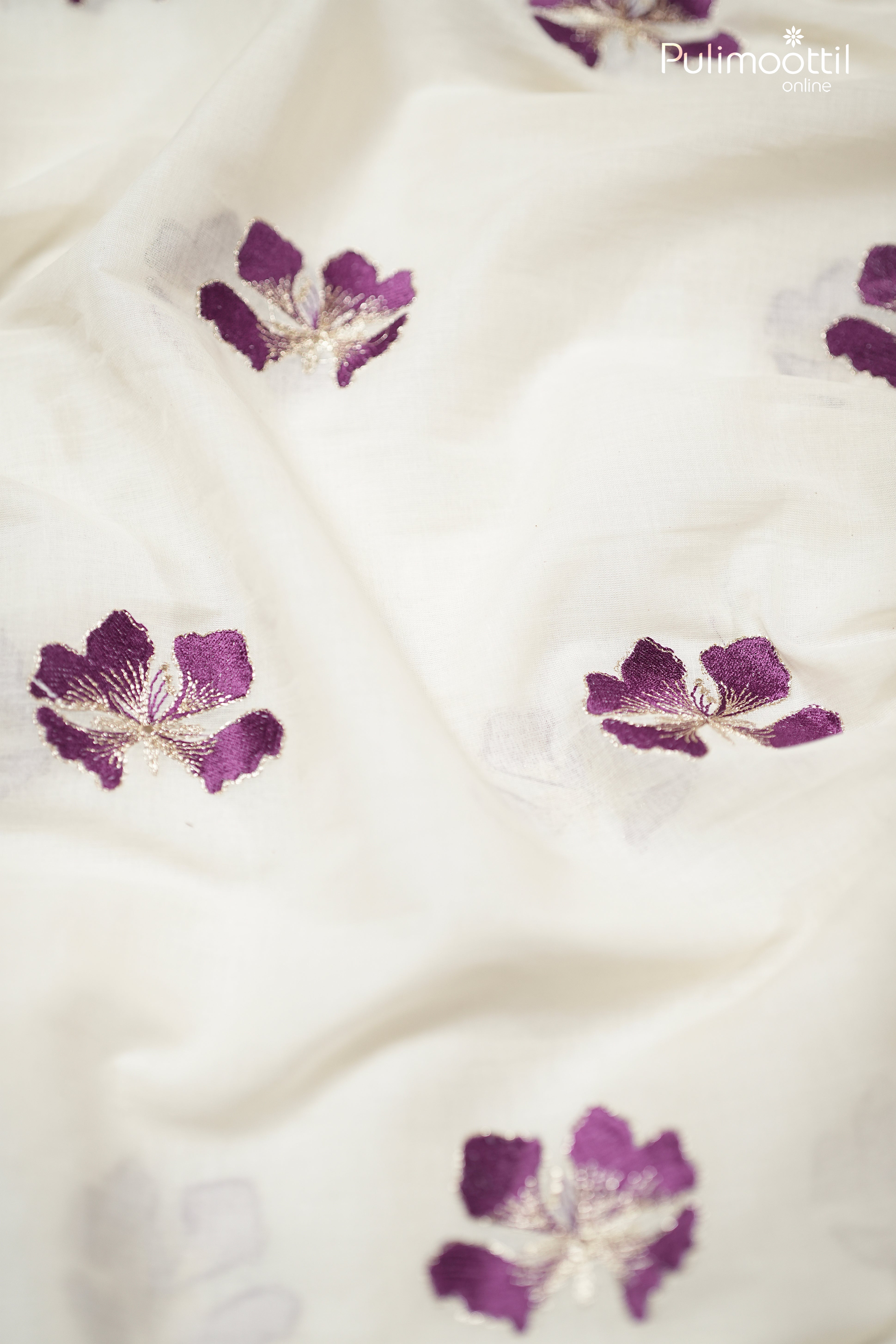 Off-White Color Cotton Fabric With Purple Floral Embroidery