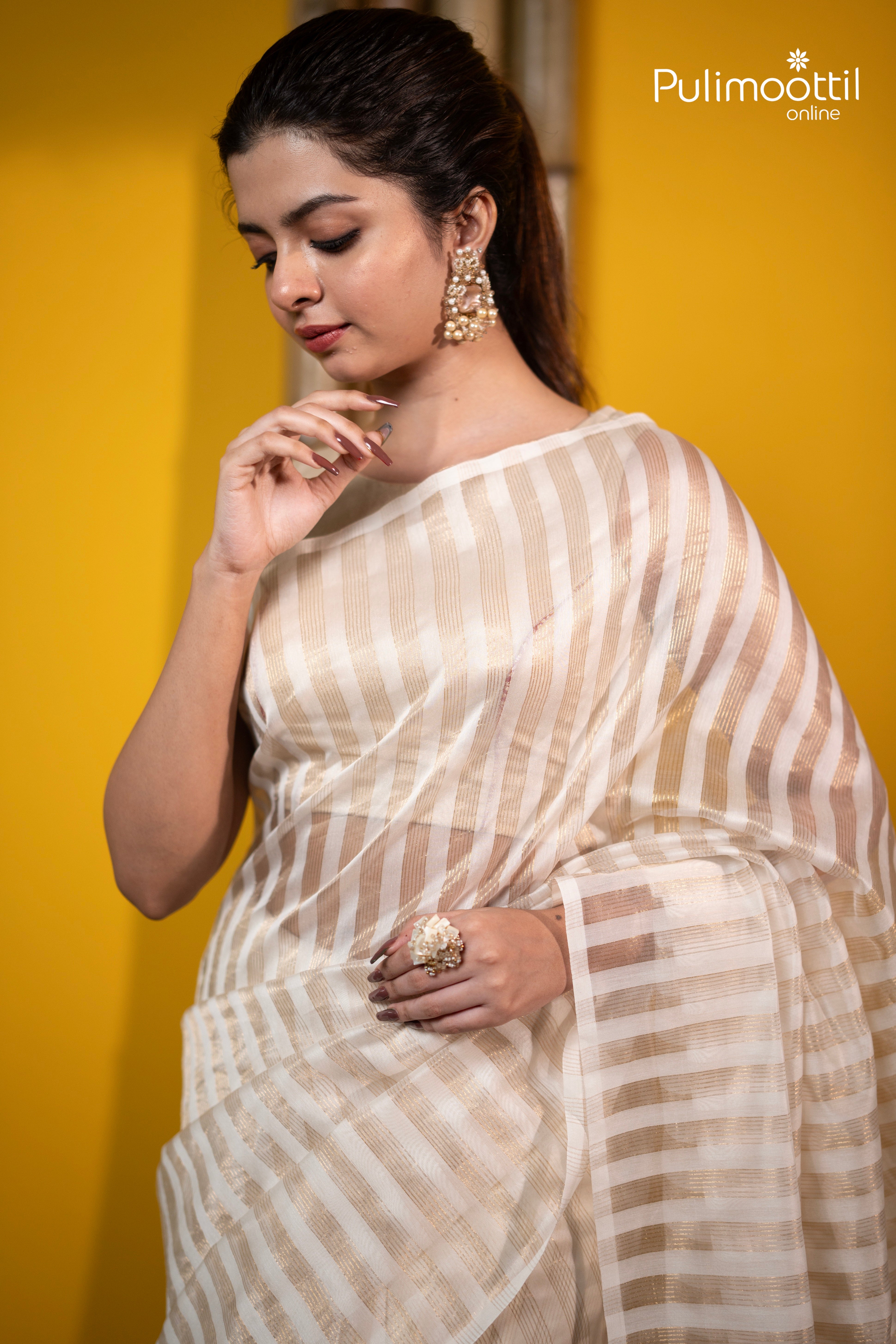 Offwhite Colour Semi Chanderi Traditional Saree