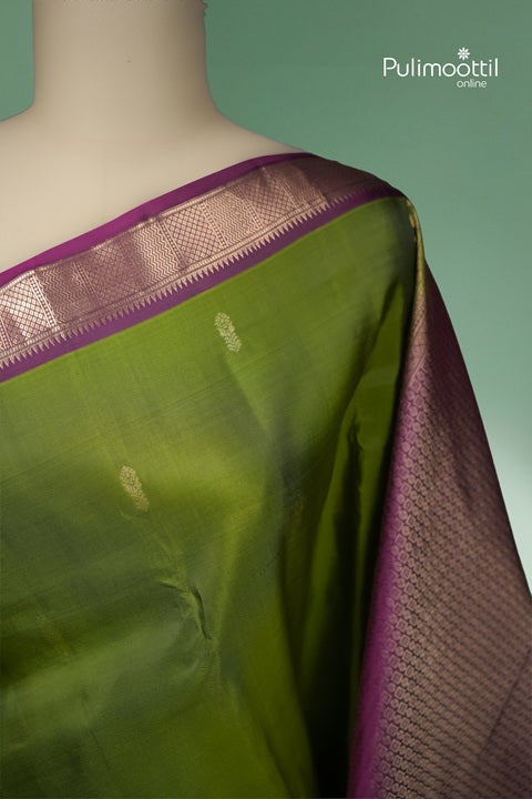 Olive Green Kanchipuram Silk Saree with Contrast Border.