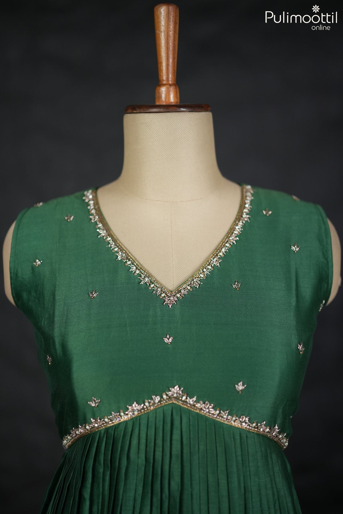 Bottle green Chanderi A-line kurti.