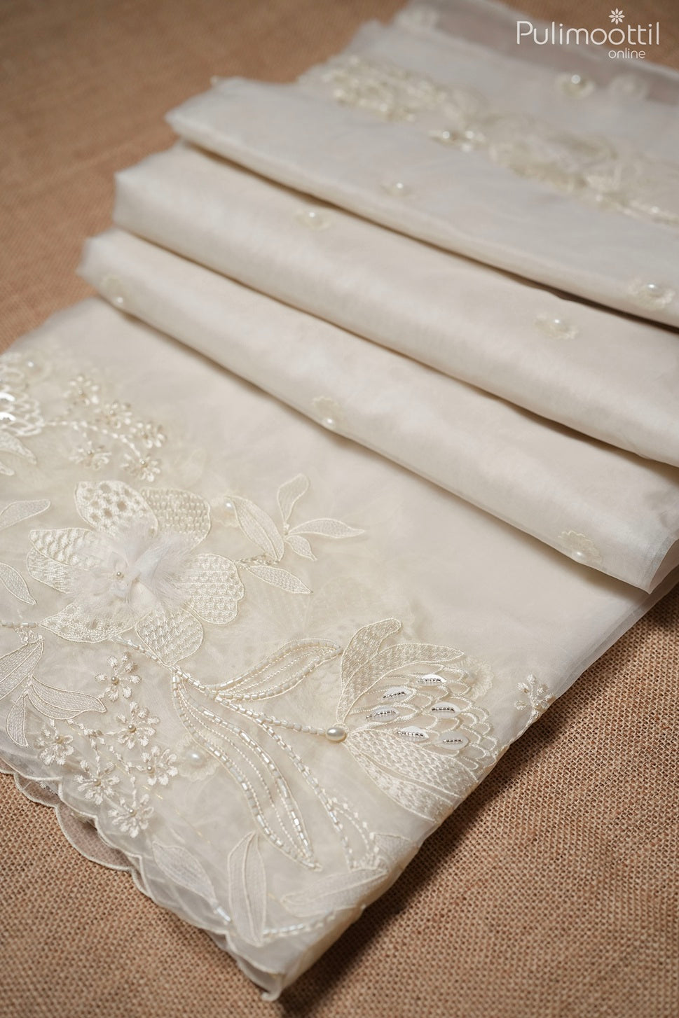 Off-white color organza fancy saree