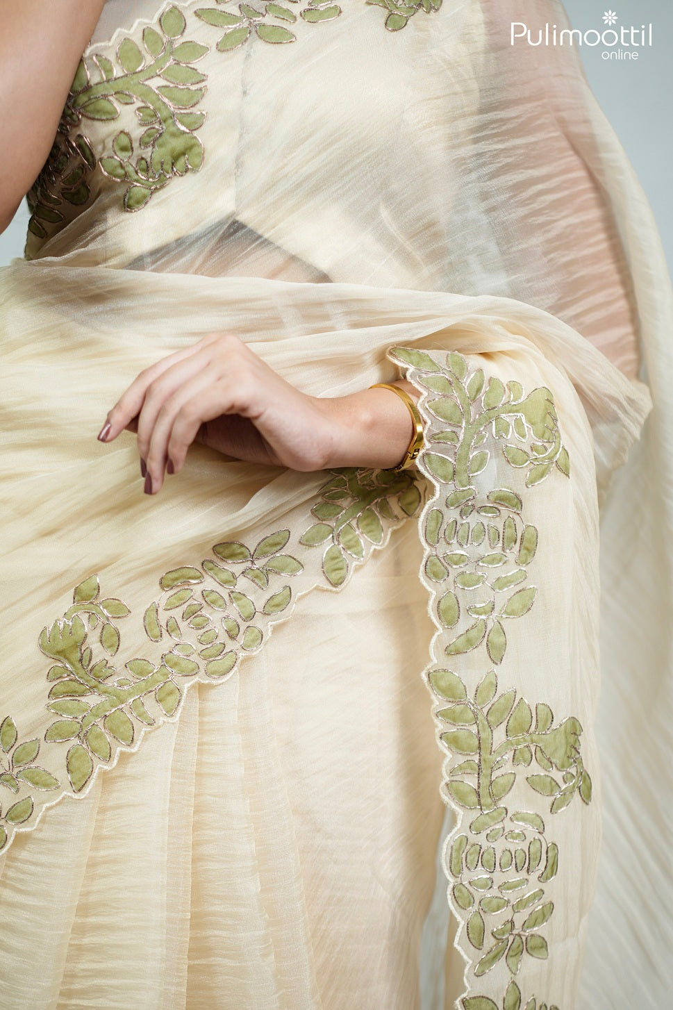 Ivory color crushed organza fancy saree