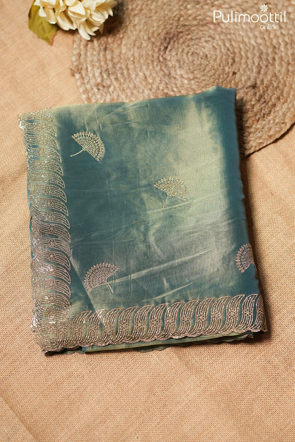 Teal blue color tissue organza fancy saree