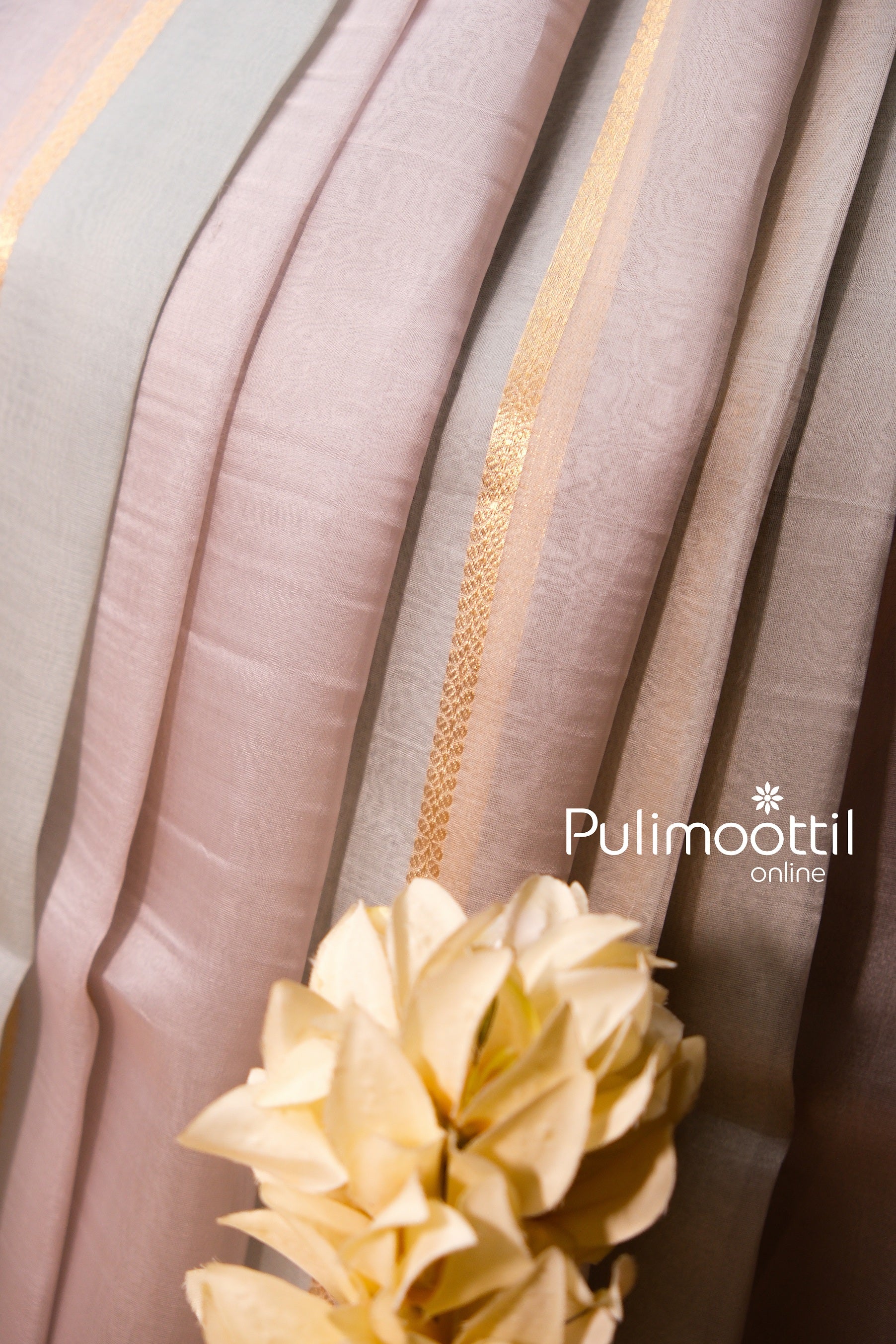 Organza bridal saree body in ash tone with fine stripes, ideal for wedding functions and bridal events.