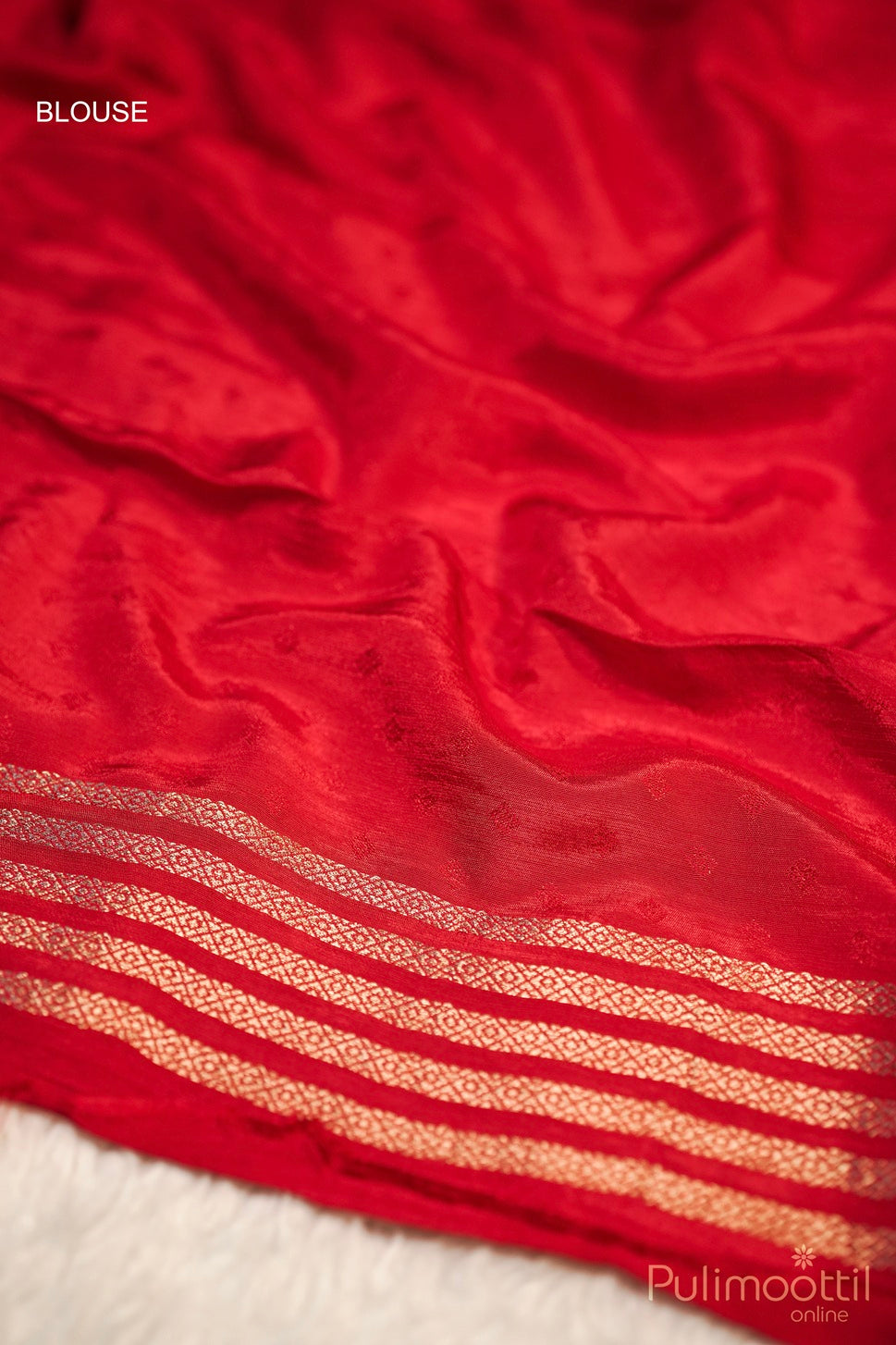 Red silk blouse fabric with gold embroidered stripes, ideal for traditional saree ensembles