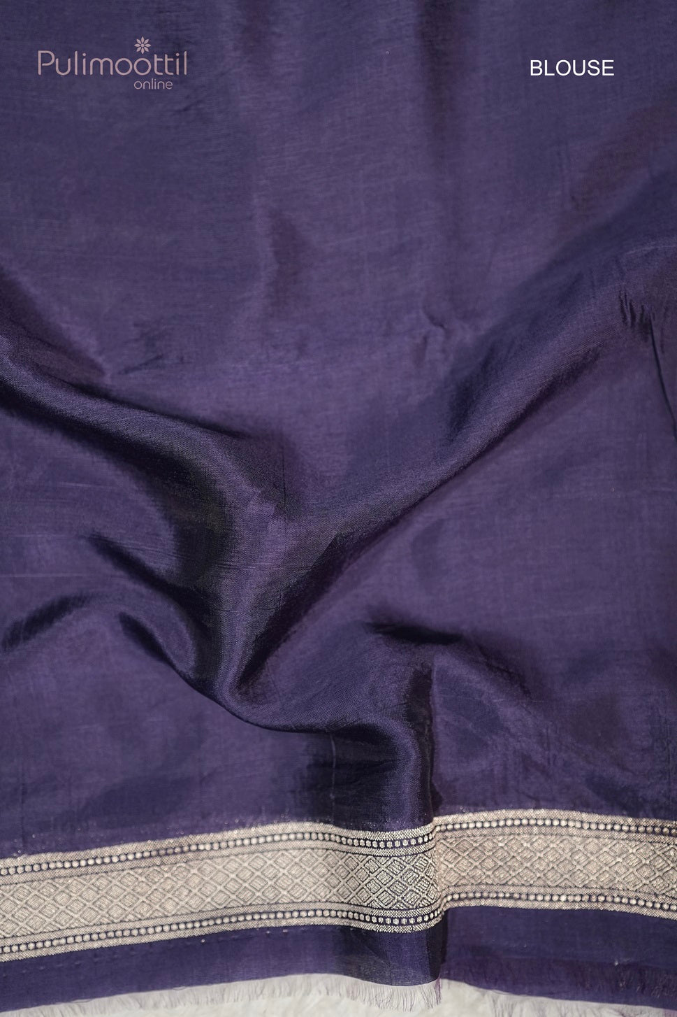 Plain dark violet Chiniya silk saree blouse with elegant border, complementing the saree for wedding saree, bridal saree, or party wear looks.