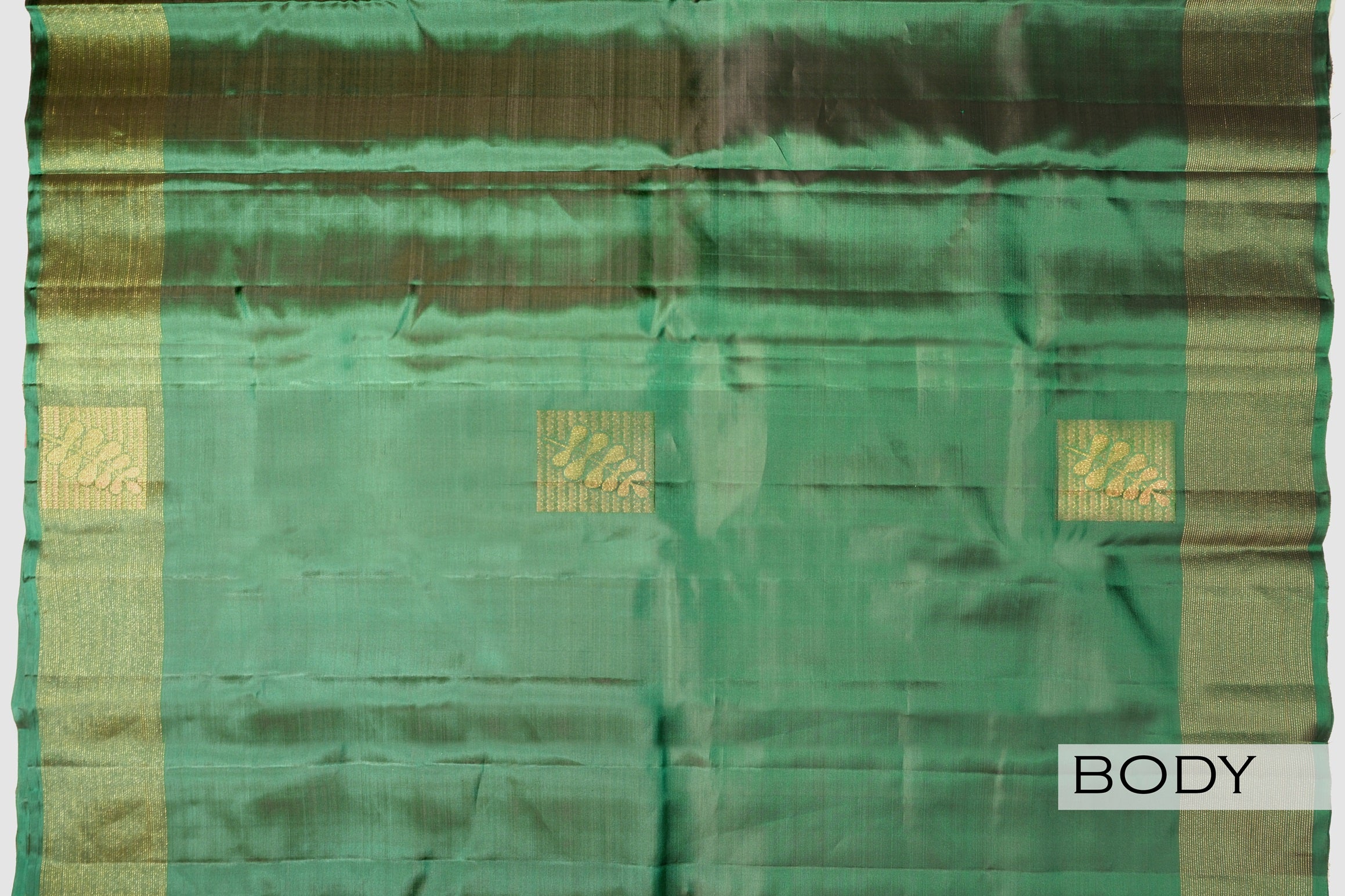 Green color pure Kanchipuram silk saree.