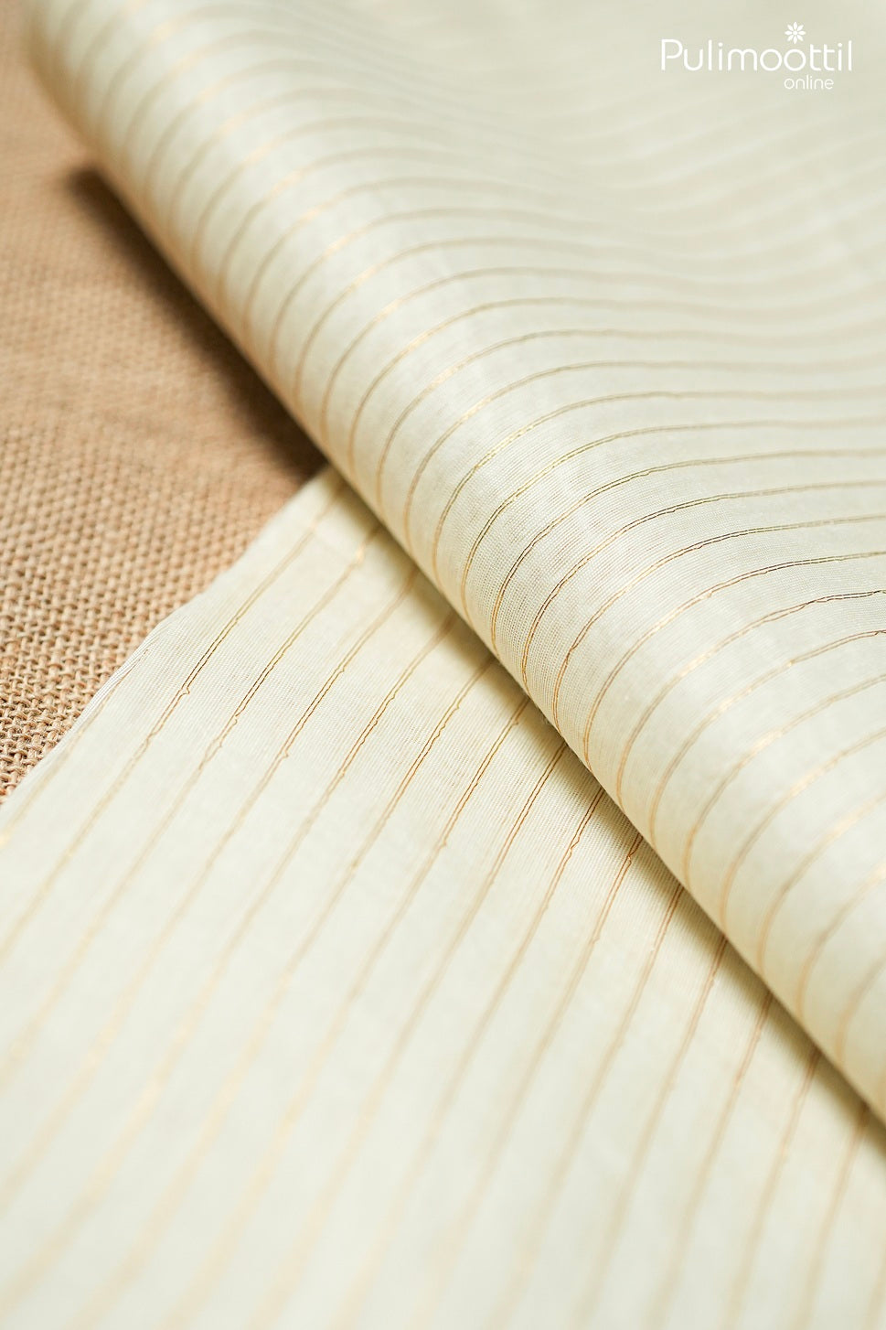 Off white color semi Chanderi traditional fancy saree