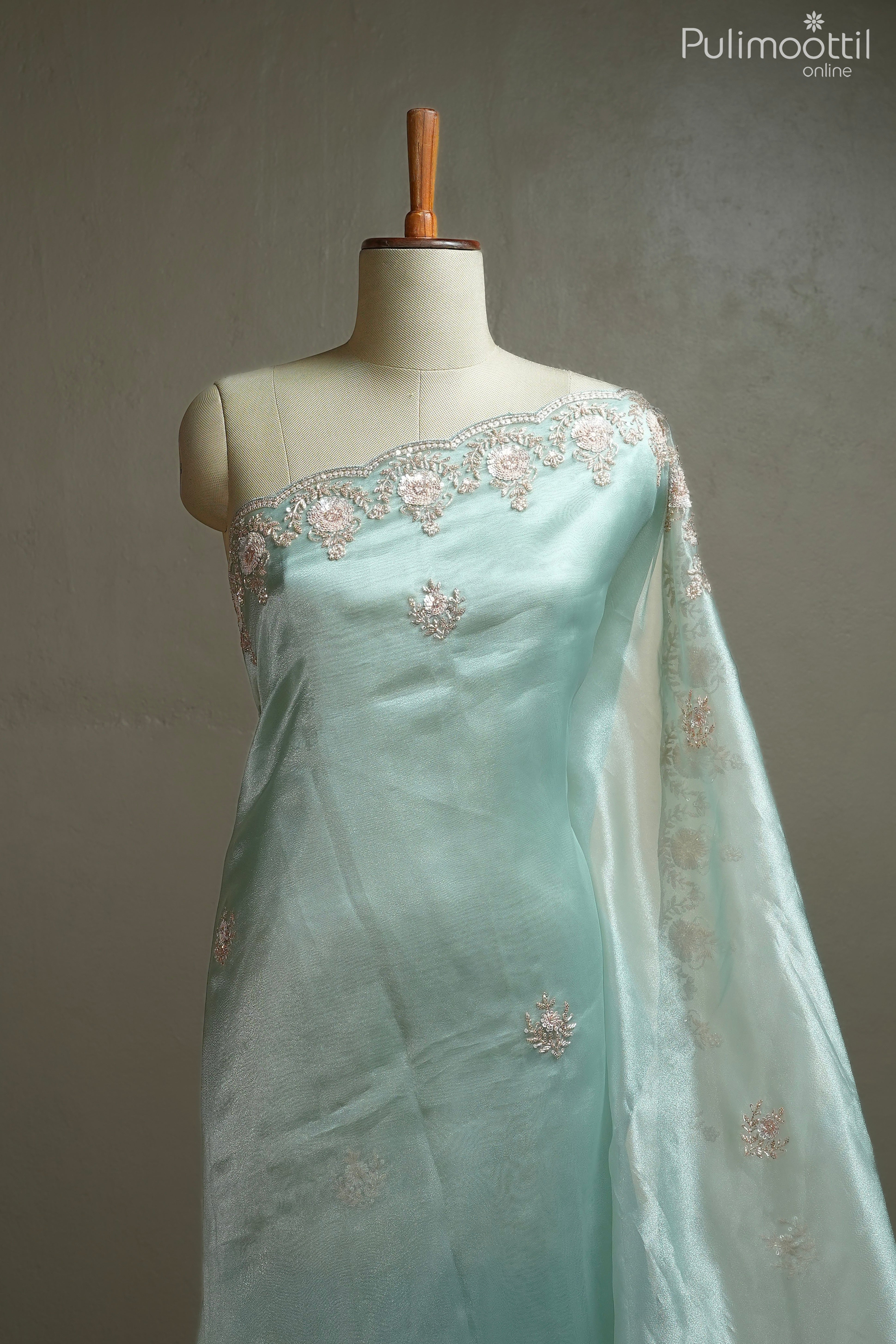 Pista green color organza fancy saree