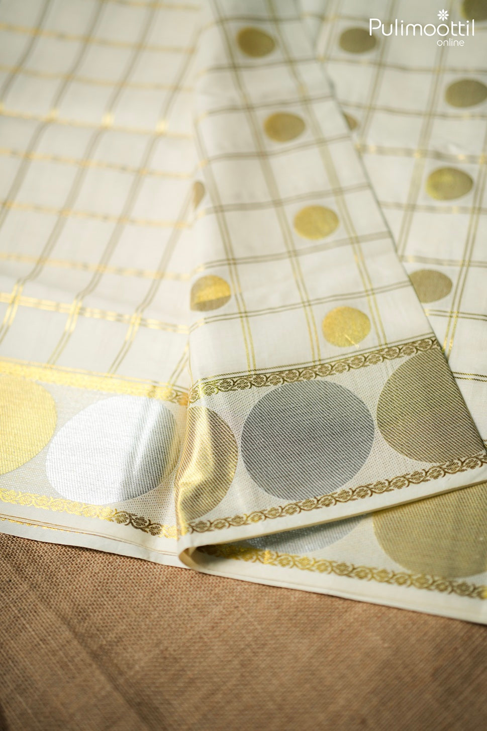 Off white color Kerala traditional golden set saree)