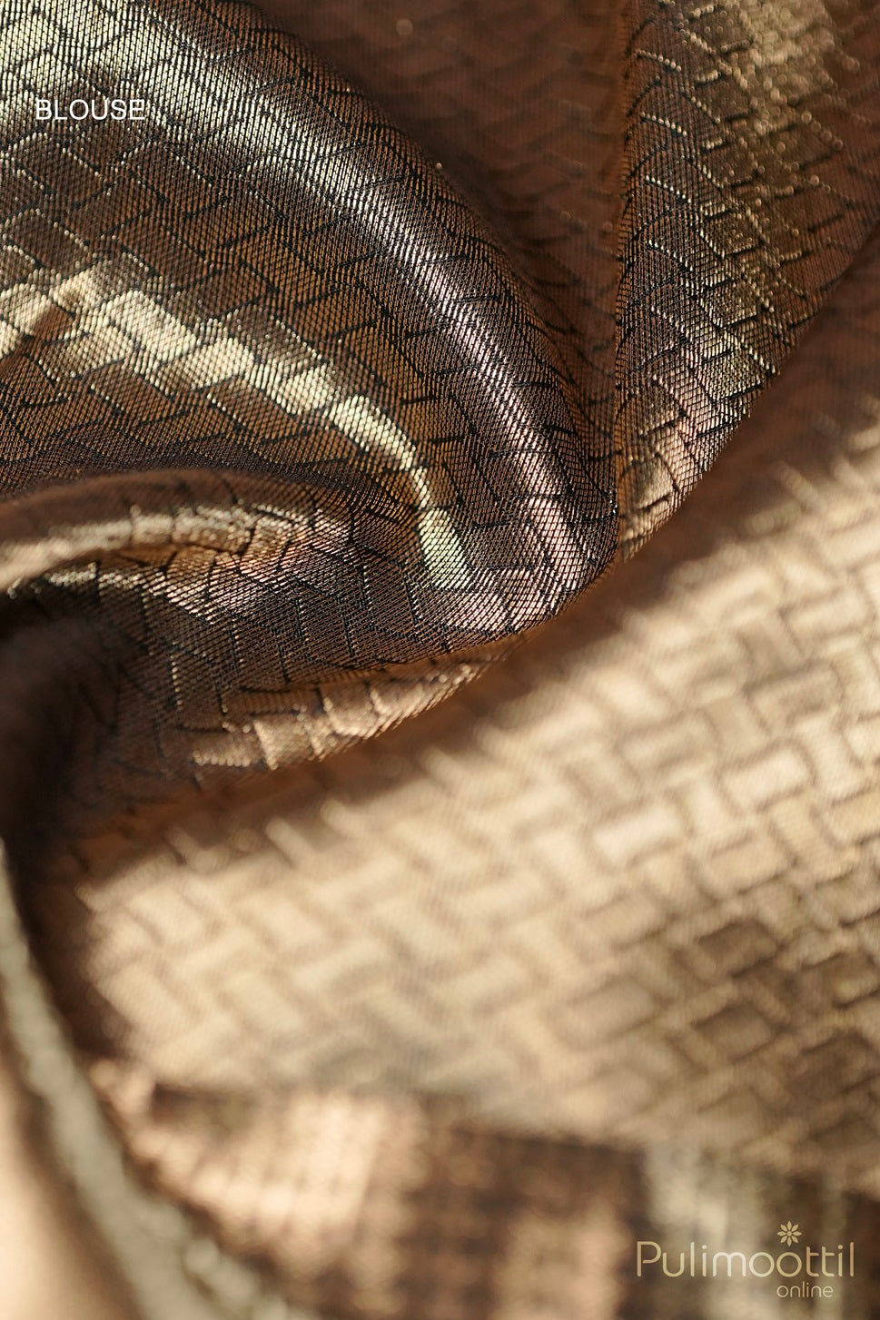 Blouse piece of black Kanchipuram soft silk saree in golden zari fabric with pentagon motifs